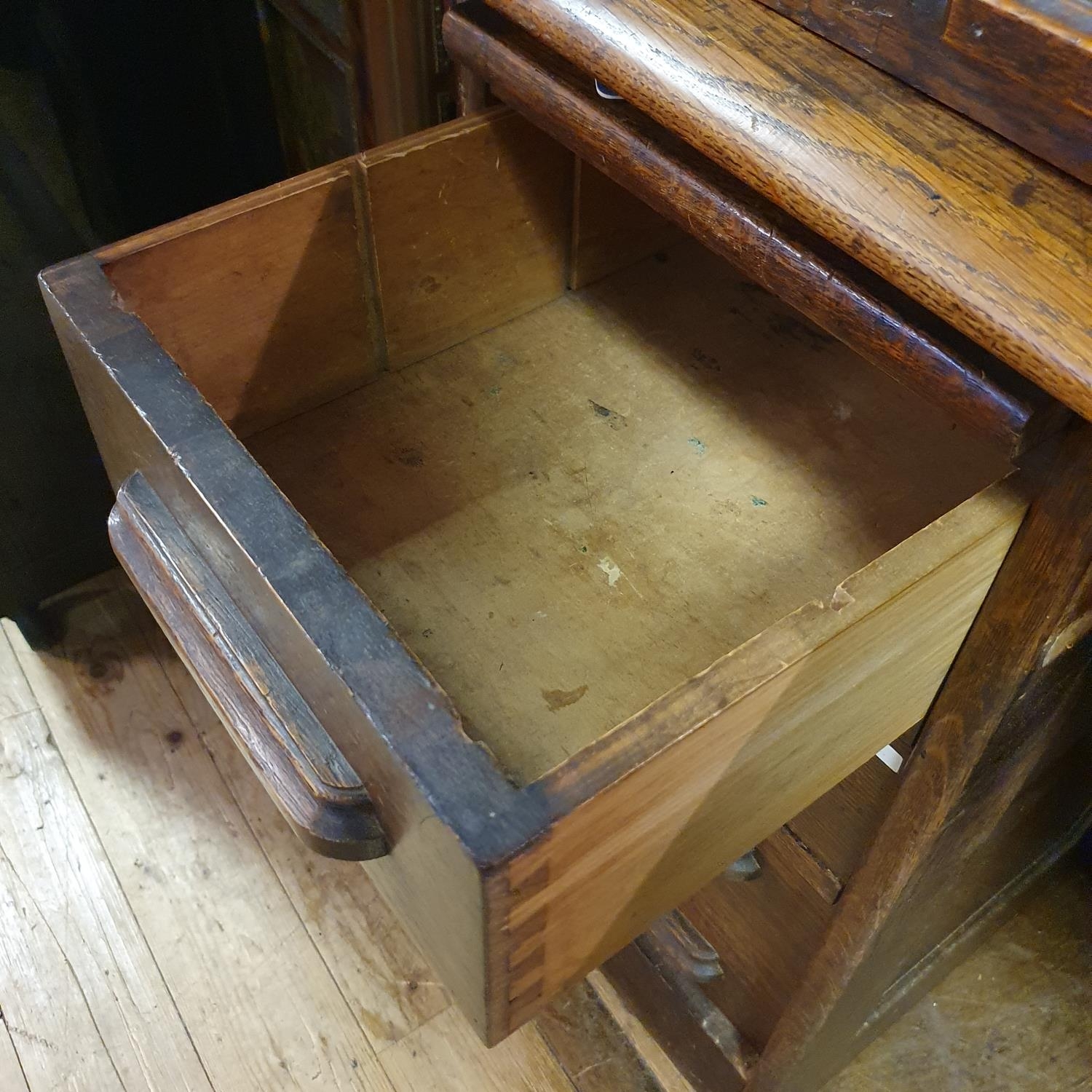 An oak tambour front desk, 128 cm wide, in need of extensive restoration, a mahogany display - Image 3 of 5