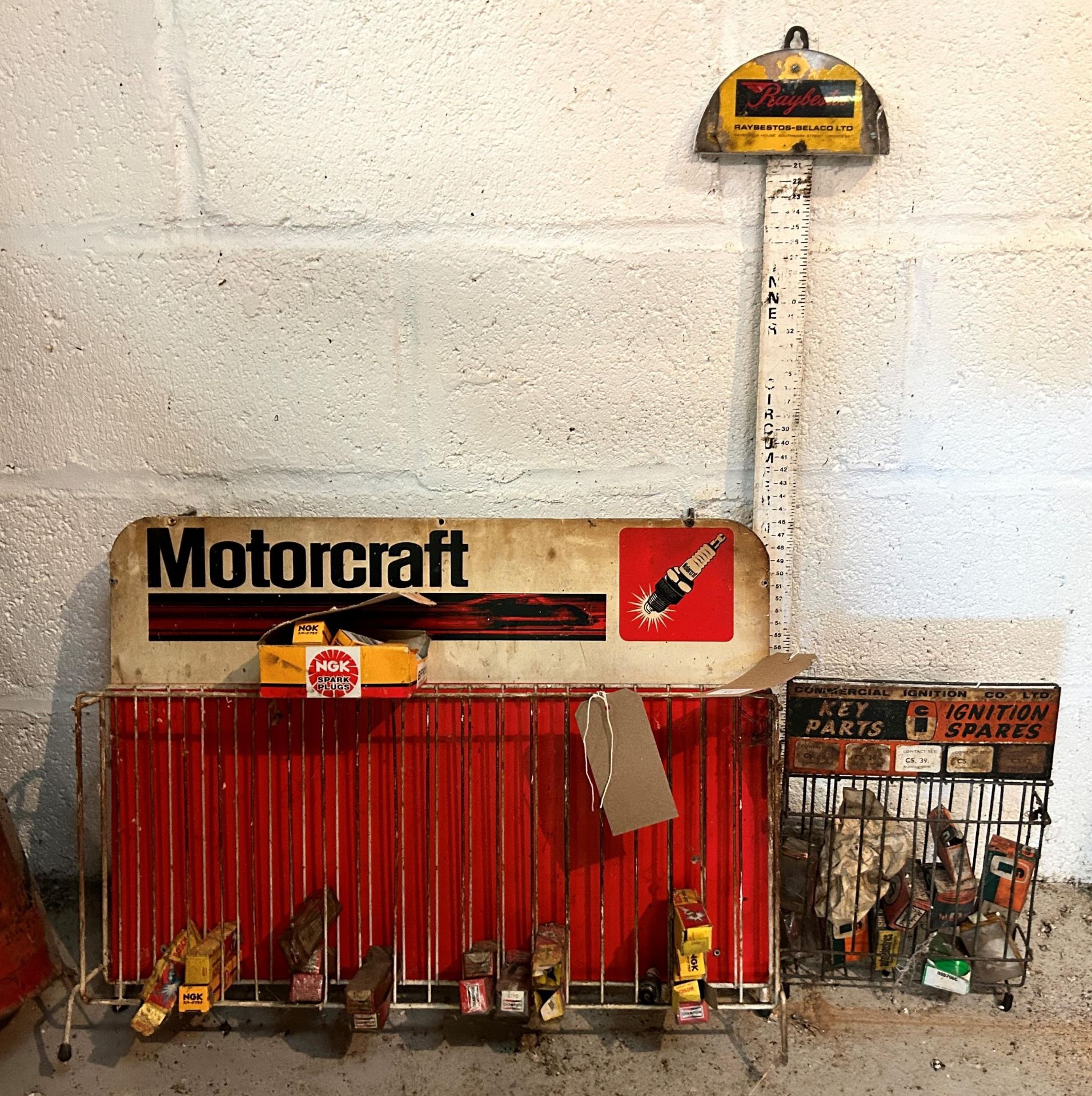 A Motorcraft Garage Sparkplug dispenser, 61 cm wide, a Commercial Ignition Key Parts/Ignition Spares