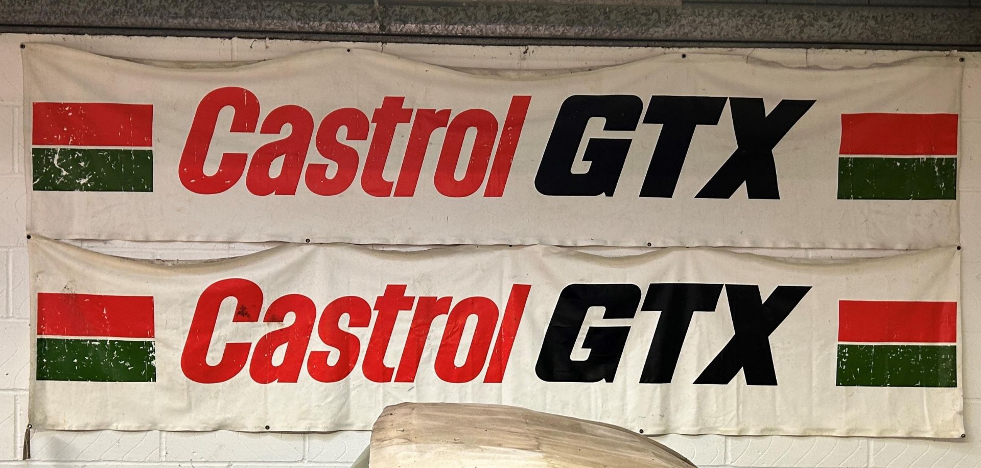 A pair of Castrol GTX banners, 60 x 295 cm Being sold without reserve