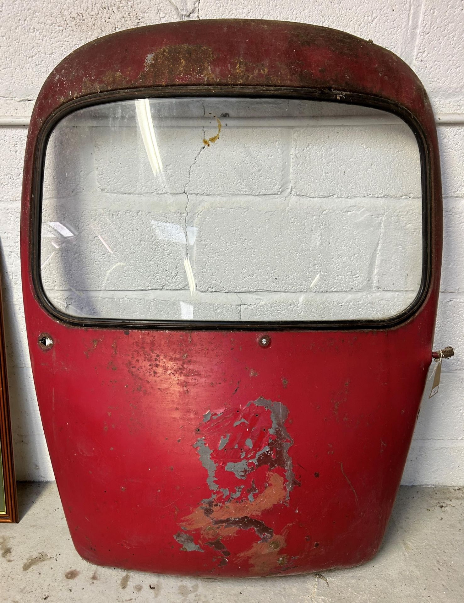 A Heinkel car door Being sold without reserve