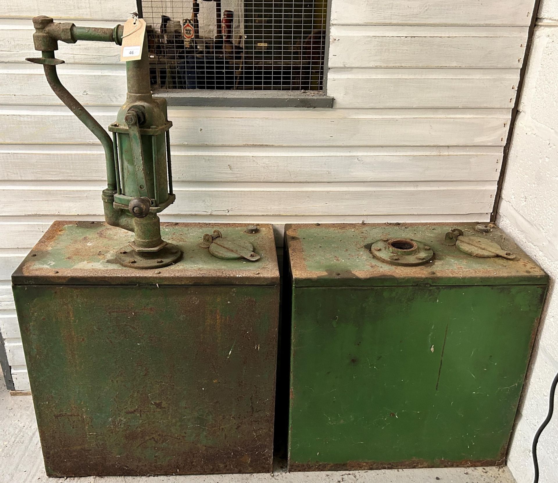 A forecourt oil dispenser and tank, 61 cm wide and another tank (2) Being sold without reserve