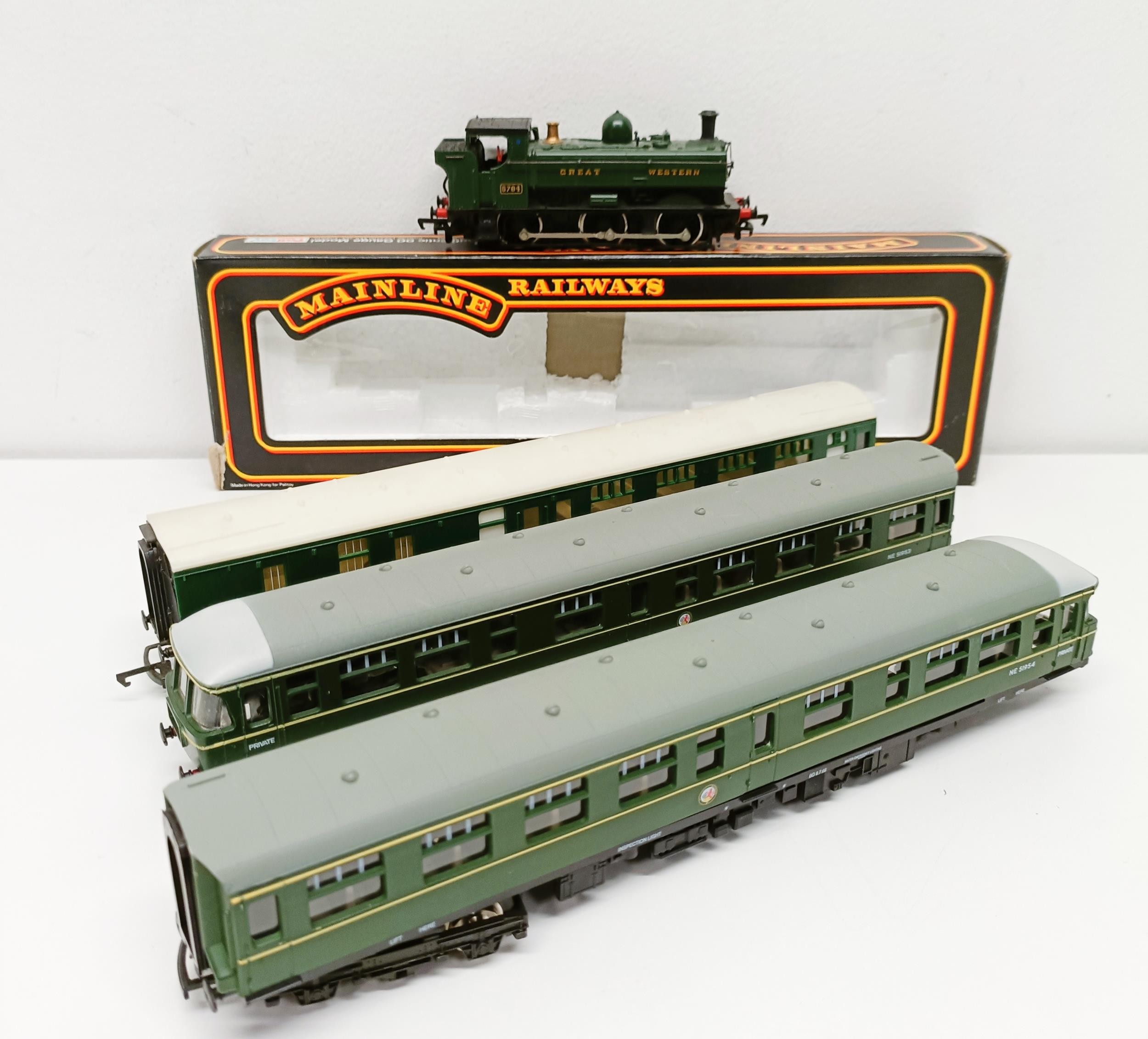 A Mainline Railways OO gauge 0-6-0 locomotive, lacking tender, No 37-058, boxed, a two car train