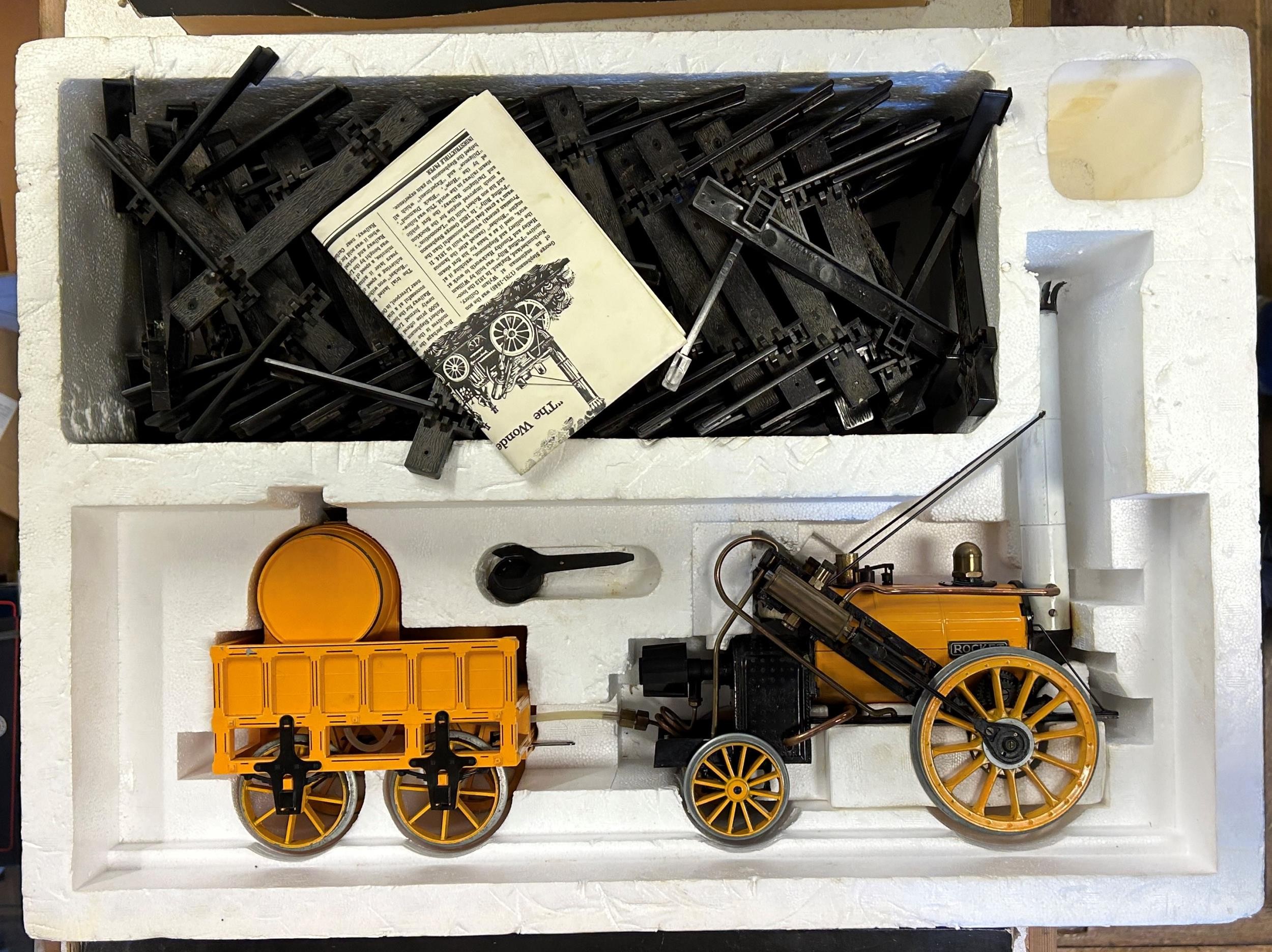 A Hornby Railways model of Stephenson's Rocket, boxed, an AG104 coach, and assorted track, all boxed - Image 2 of 5