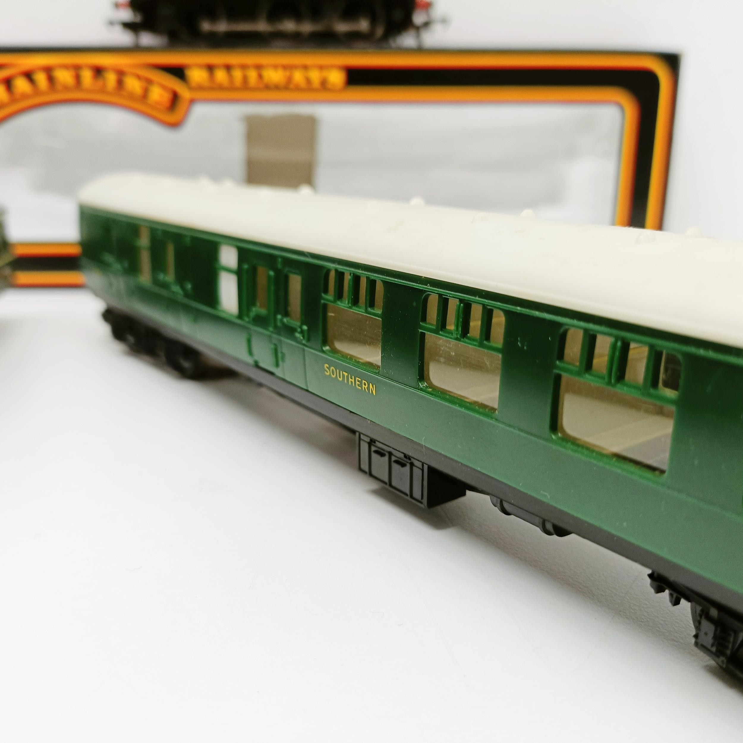 A Mainline Railways OO gauge 0-6-0 locomotive, lacking tender, No 37-058, boxed, a two car train - Image 7 of 10