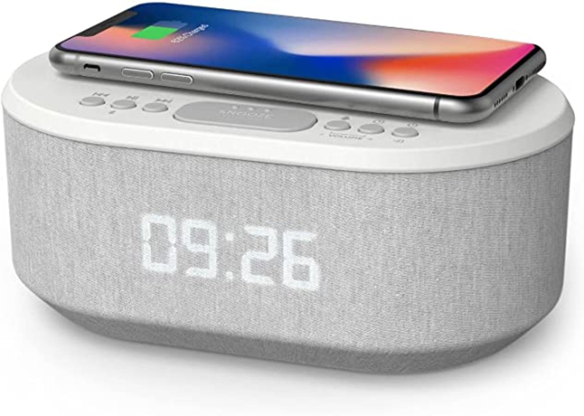 RRP - £25.76 Bedside radio controlled alarm clock with wireless charger