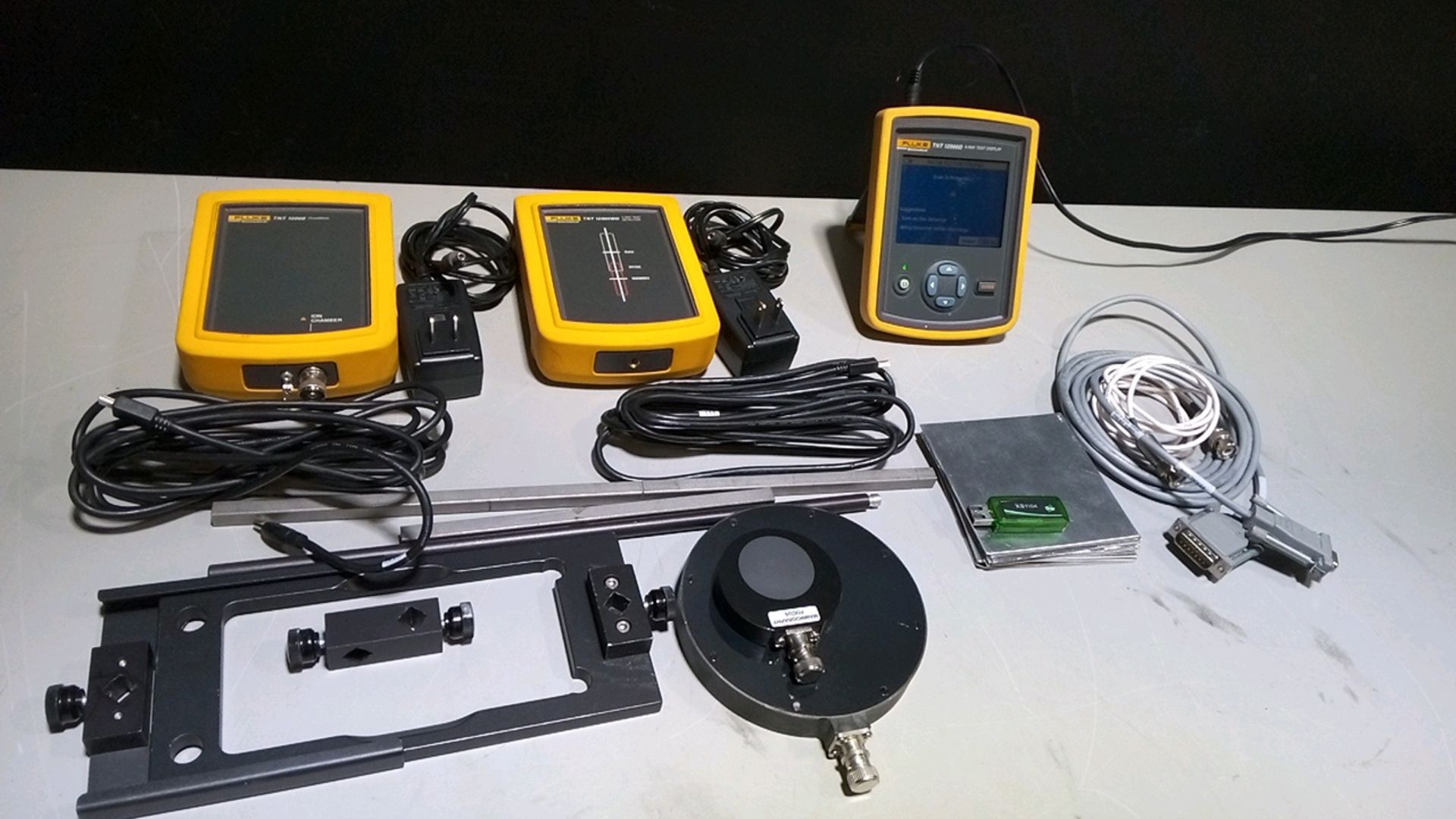 FLUKE TNT 12000 X-RAY TEST DEVICE TO INCLUDE: 12000WD DETECTOR, 12000D DISPLAY, 12000 DOSEMATE & ACC