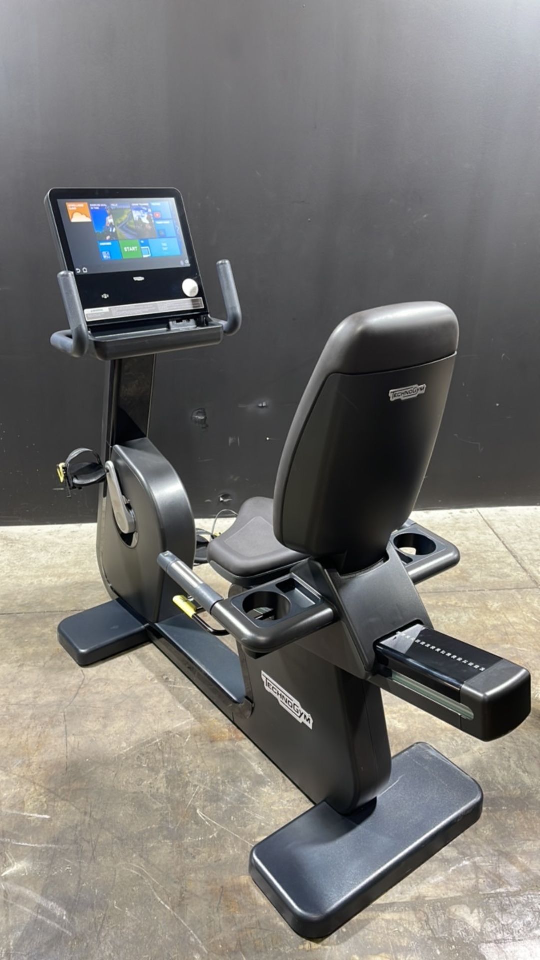 TECHNOGYM EXERCISE BIKE WITH TOUCH SCREEN MONITOR