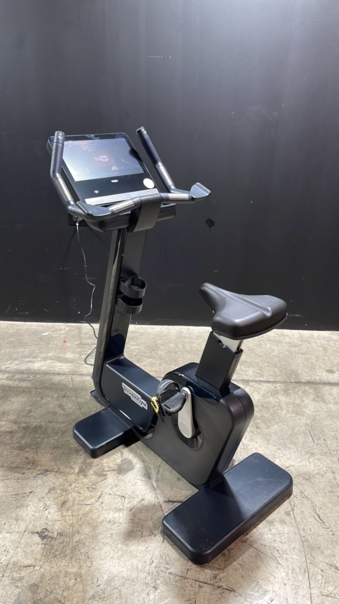 TECHNOGYM EXERCISE BIKE WITH TOUCH SCREEN MONITOR