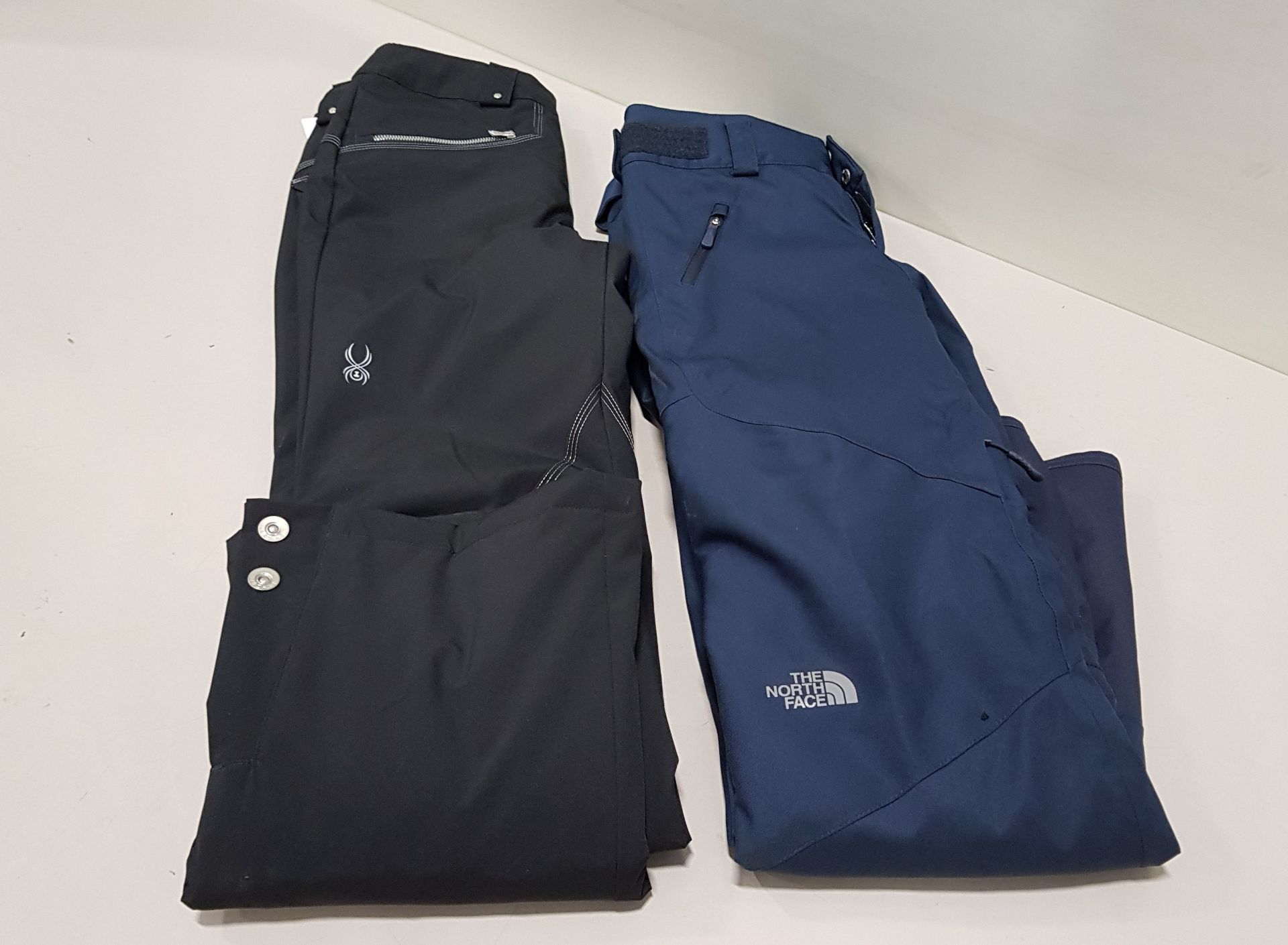 2 X BRAND NEW SKI PANTS IE NORTH FACE AND SPYDER SIZE XS