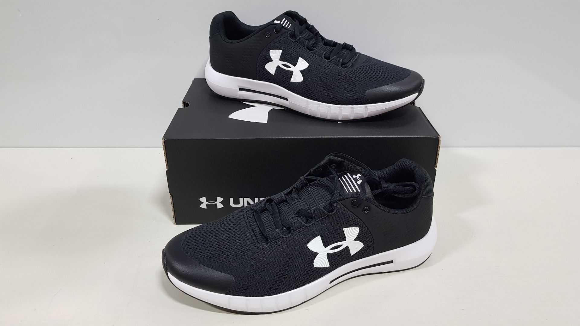 8 X BRAND NEW UNDER ARMOR MICRO G PURSUIT IN BLACK AND WHITE - SIZE UK 10