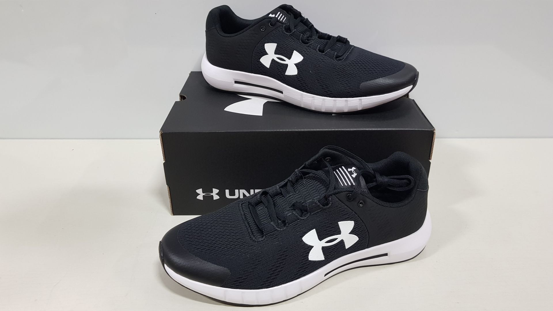 7 X BRAND NEW UNDER ARMOR MICRO G PURSUIT IN BLACK AND WHITE - SIZE UK 7