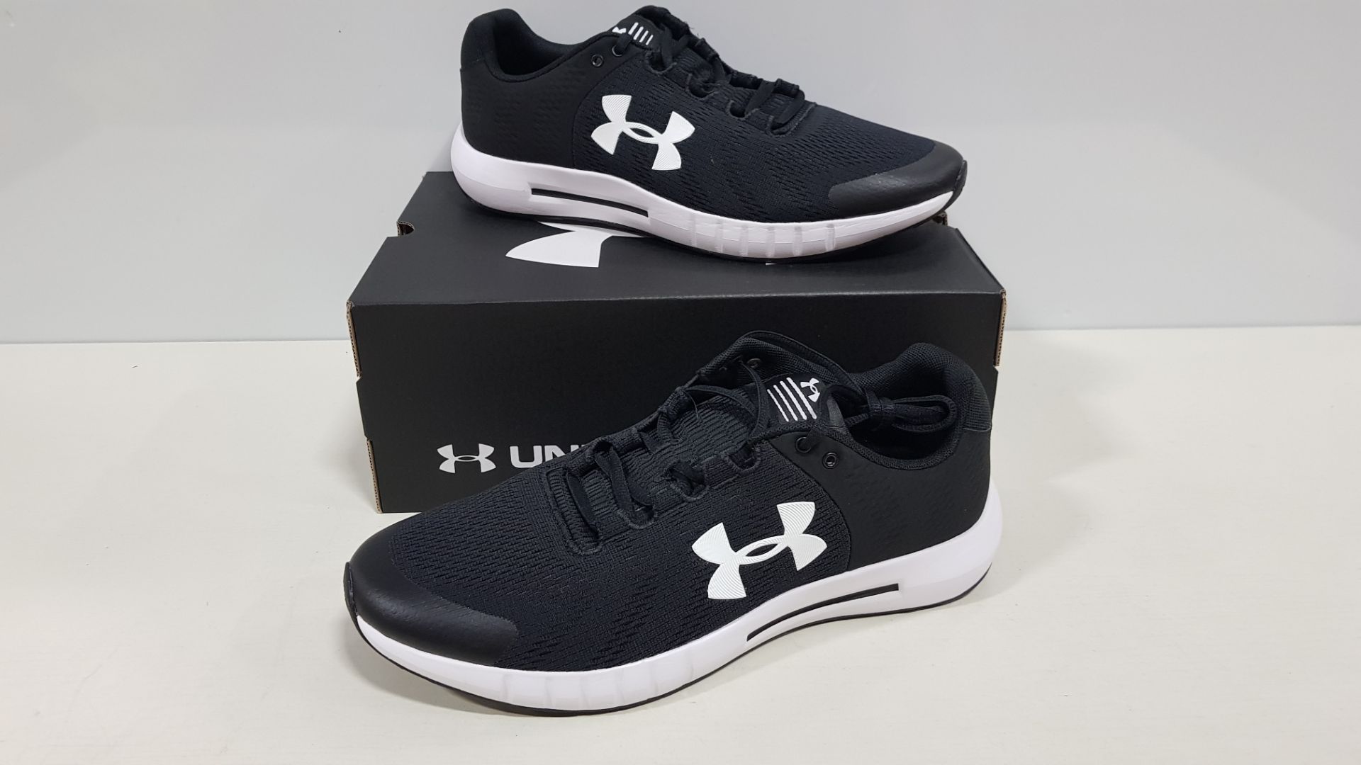 7 X BRAND NEW UNDER ARMOR MICRO G PURSUIT IN BLACK AND WHITE - SIZE UK 7