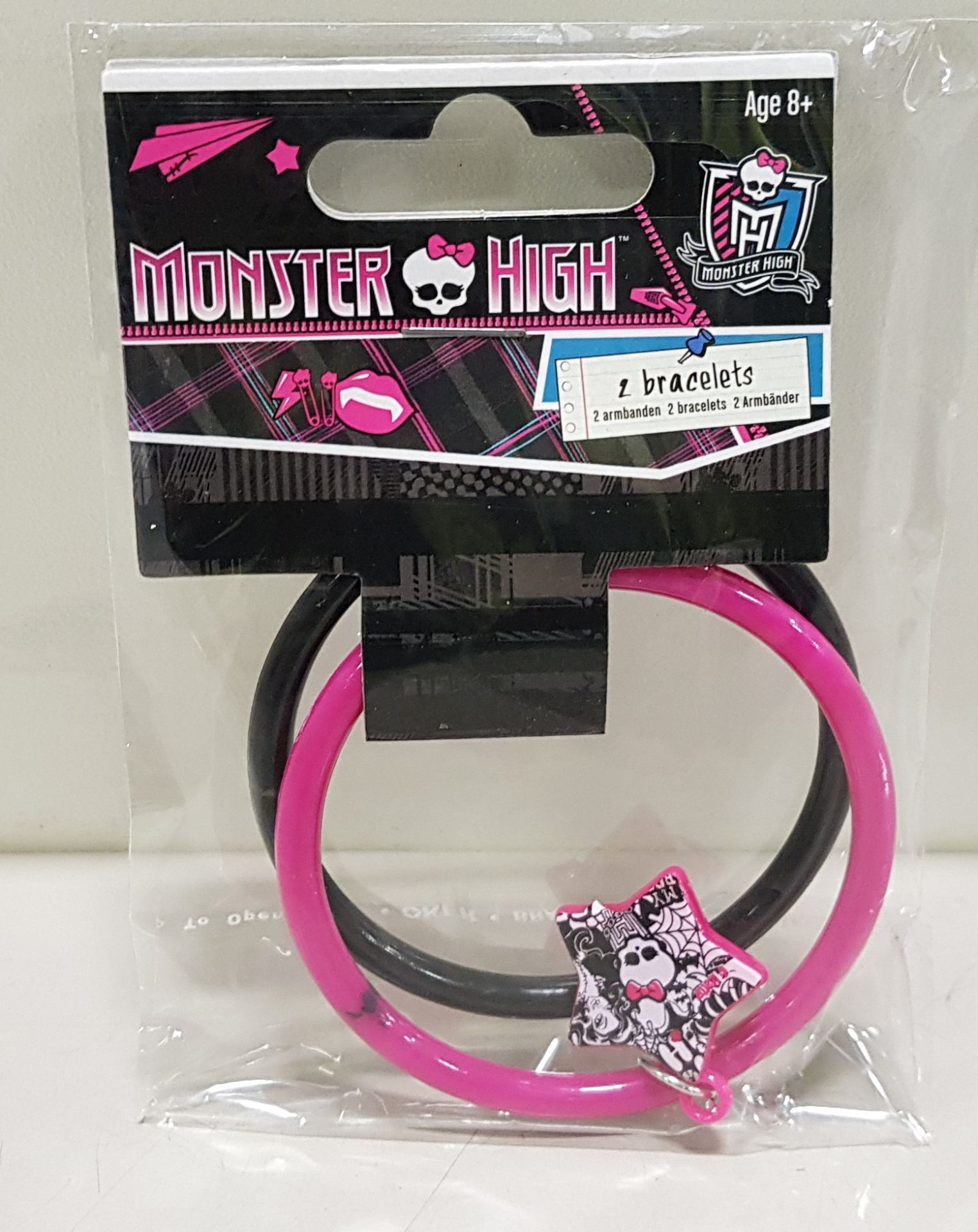 APPROX 3500 MONSTER HIGH SET OF 2 BRACELETS WITH CHARM IN PINK AND BLACK