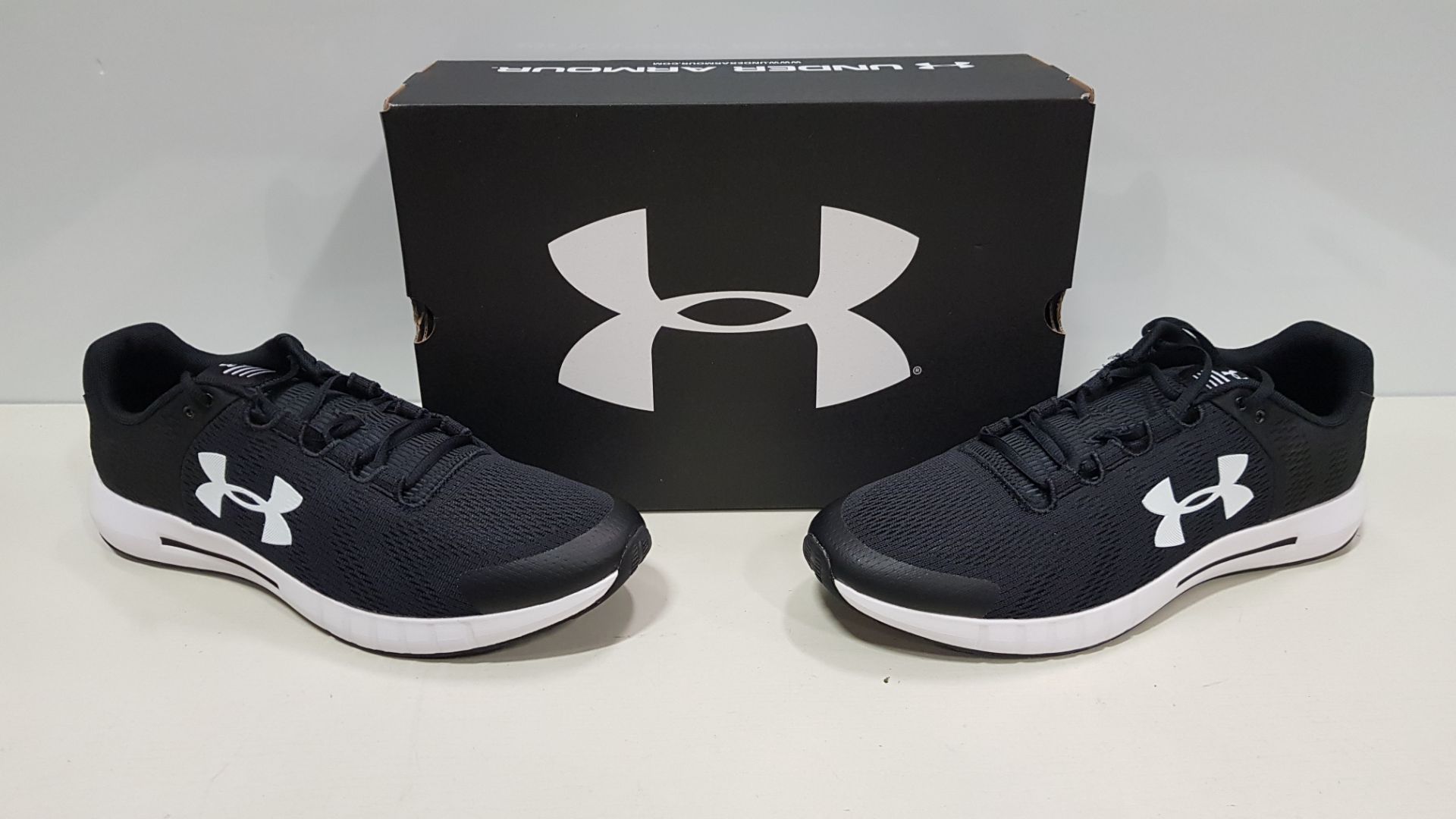 6 X BRAND NEW UNDER ARMOUR UA MICRO G PURSUIT BP IN BLACK AND WHITE ( SIZE UK 12 )