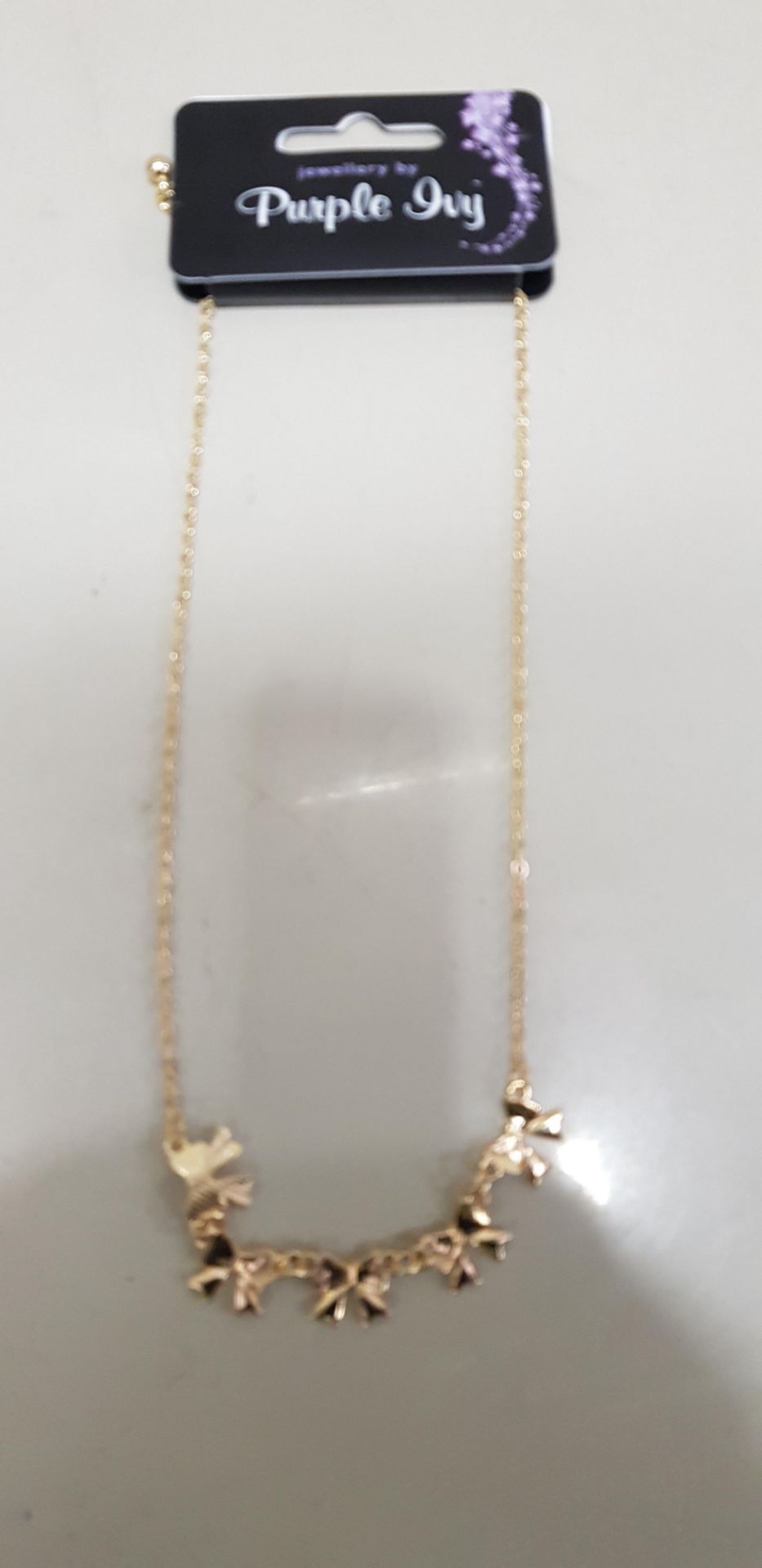 3120 X BRAND NEW PURPLE IVY ( 5 BOW) GOLD COLOURED NECKLACES.