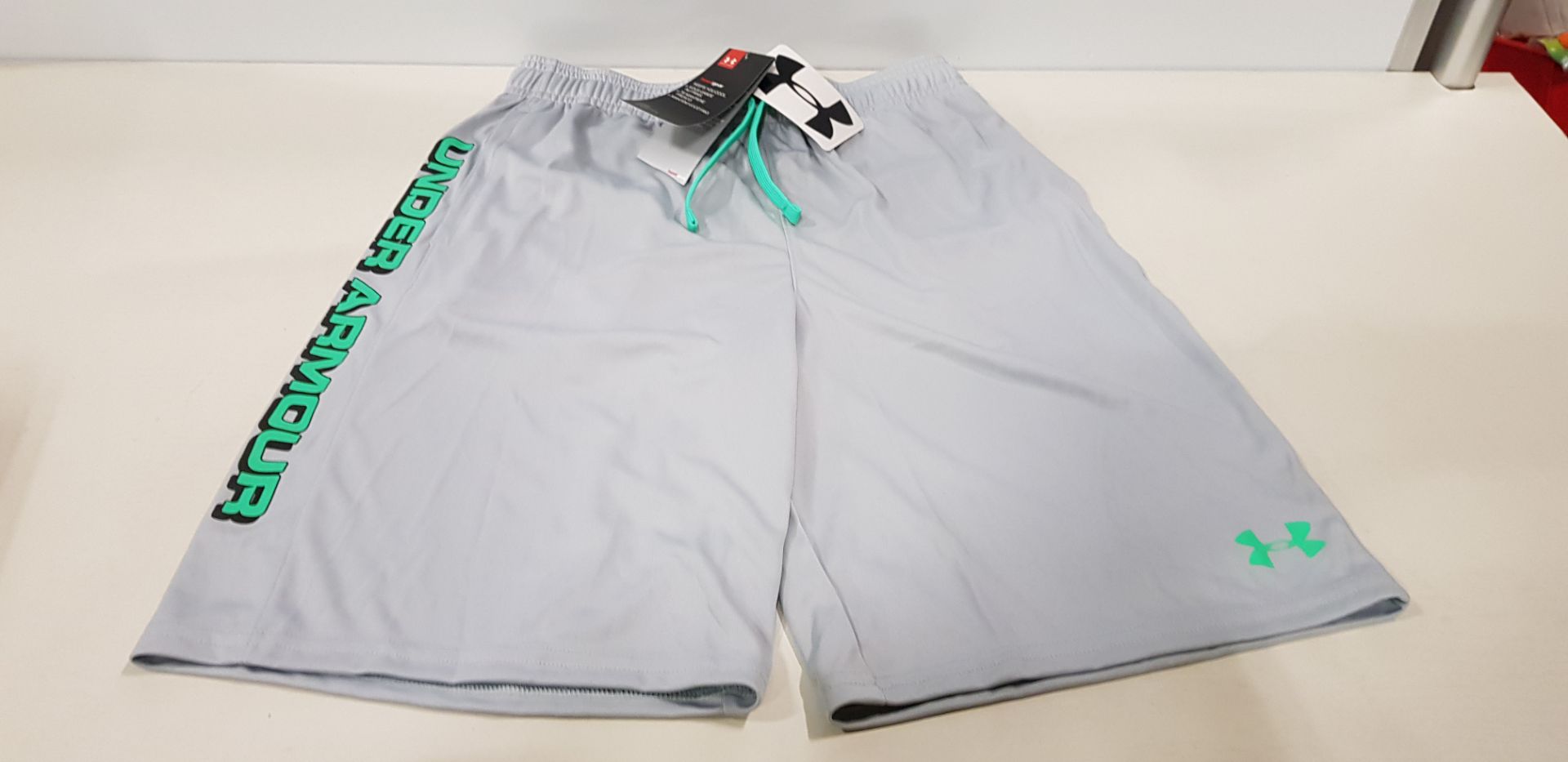 20 X BRAND NEW UNDER ARMOUR GREY SHORTS SIZE YOUTH LARGE