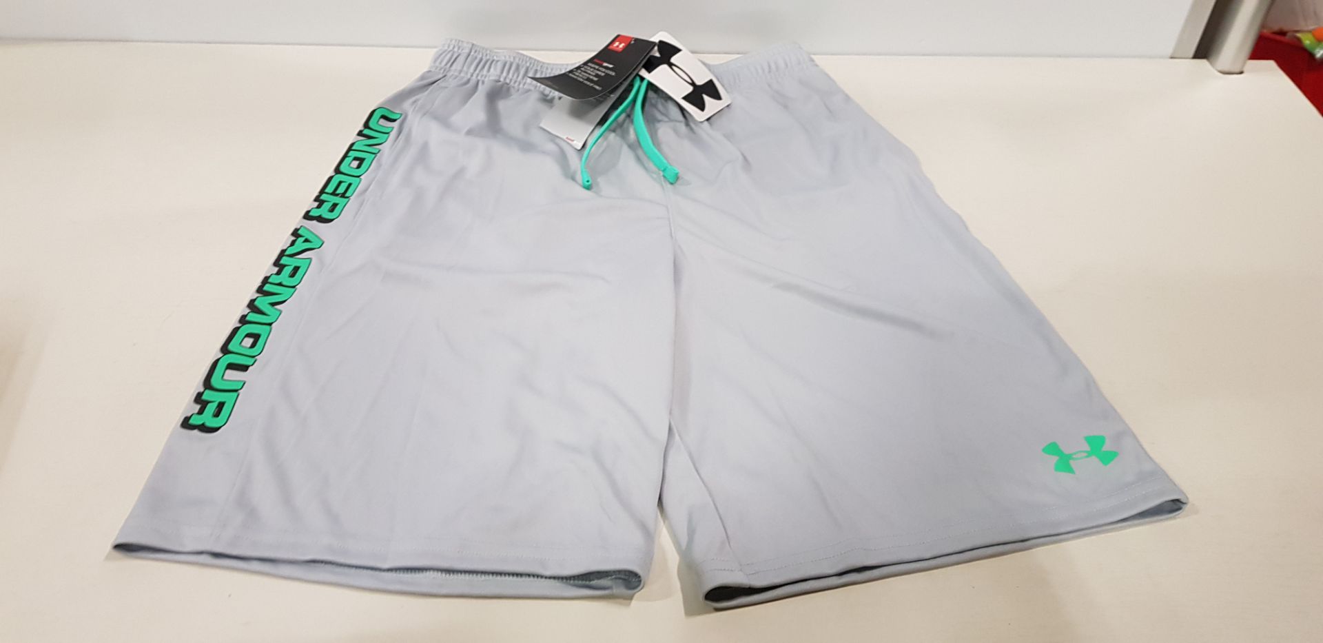16 X BRAND NEW UNDER ARMOUR GREY SHORTS SIZE YOUTH XL
