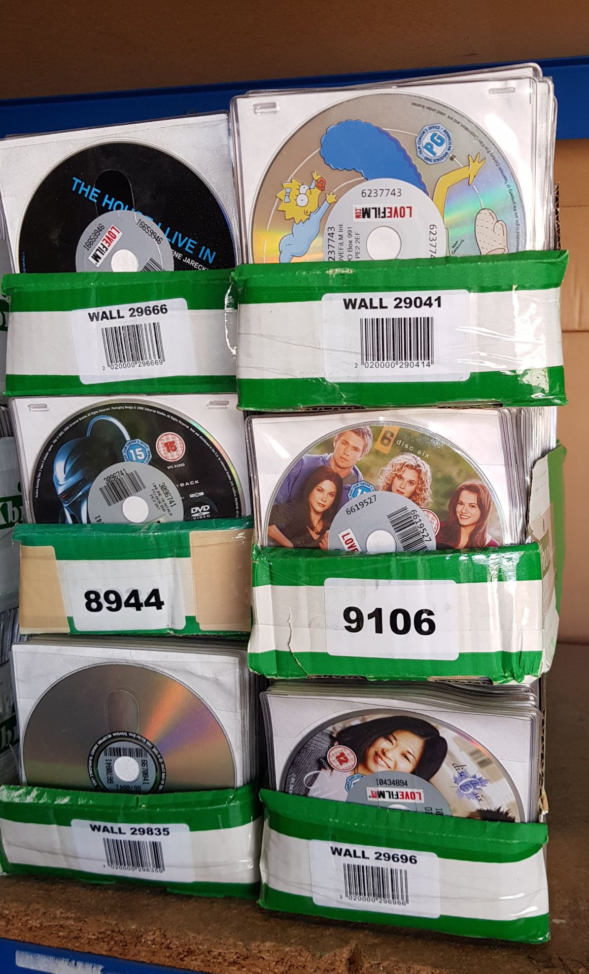 1200 PIECE MIXED DVD LOT CONTAINING SIMPSONS, MICHEAL MCYNTIRE LIVE, THE ASSASSAIN, FAMILY GUY AND