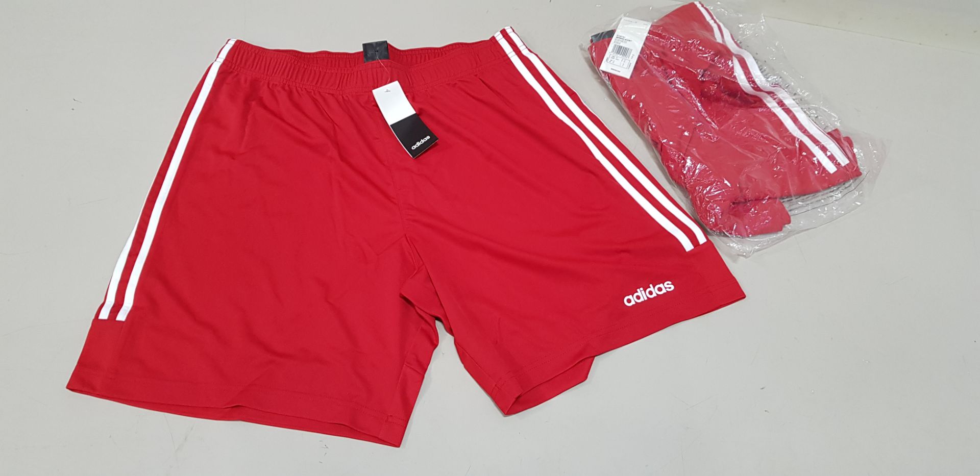 26 X BRAND NEW ADIDAS RED SERENO 3 STRIPE SHORTS IN SIZE UK MEDIUM