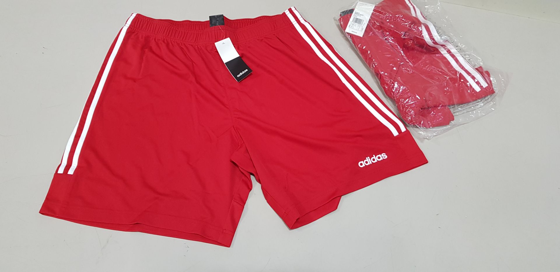 27 X BRAND NEW ADIDAS RED SERENO 3 STRIPE SHORTS IN SIZE UK SMALL