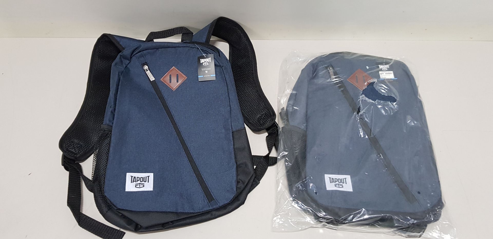 12 X BRAND NEW TAPOUT NAVY BACKPACKS RRP £29.99 (TOTAL RRP £359.88)