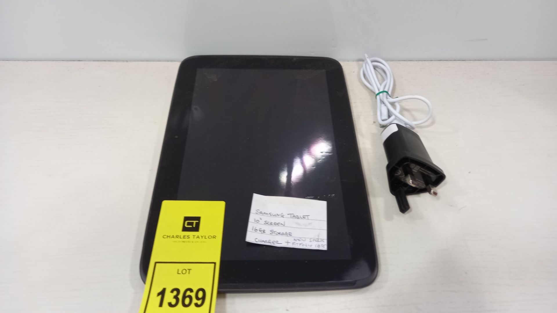 SAMSUNG TABLET 10 SCREEN , 16GB STORAGE AND COMES WITH CHARGER.