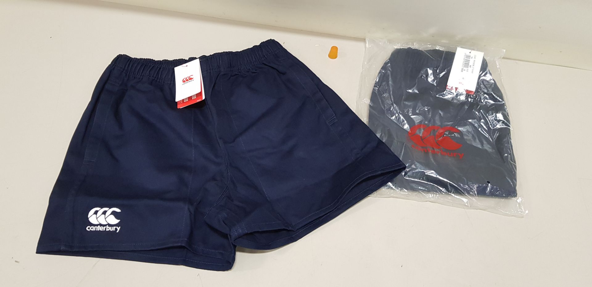 26 X BRAND NEW CANTERBURY COTTON SHORTS IN NAVY SIZE MEDIUM