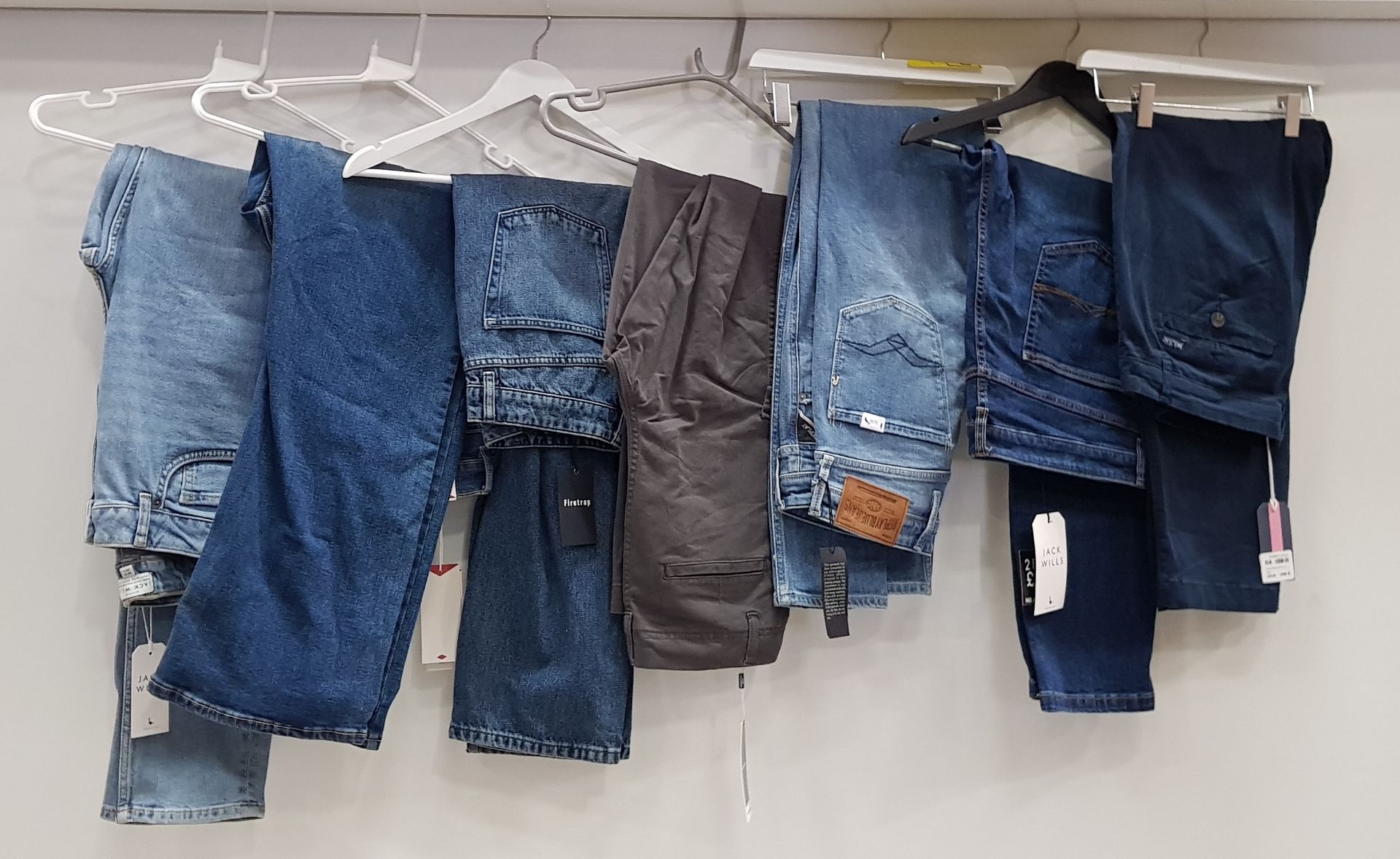 7 X BRAND NEW MIXED DESIGNER JEANS LOT CONTAINING LEE COOPER, JACK WILLS, FIRETRAP AND REPLAY
