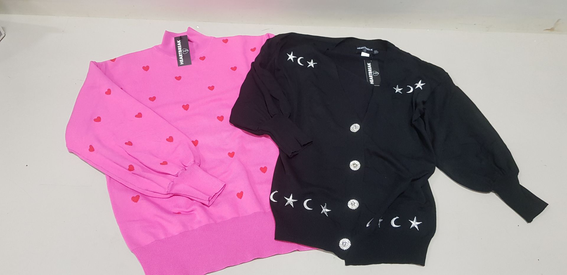 30 PIECE MIXED HEARTBREAK CLOTHING LOT CONTAINING PINK HEART TURTLENECK JUMPERS IN SIZE UK 12 AND