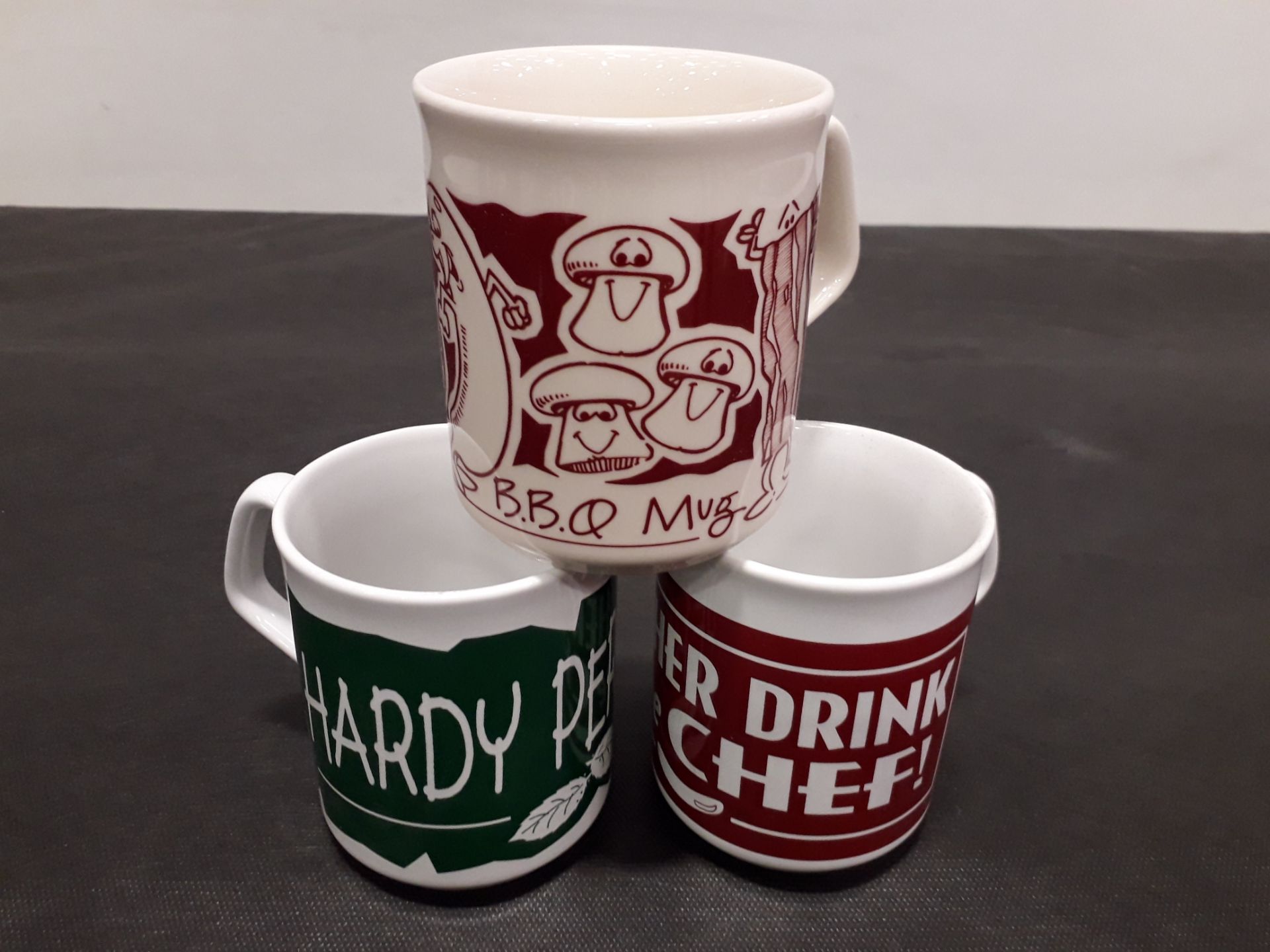 400 + BRAND NEW MUGS TO INCLUDE OFFICIAL BBQ MUG , HARDY PERENNIAL , ANOTHER FOR THE CHEF , HIS