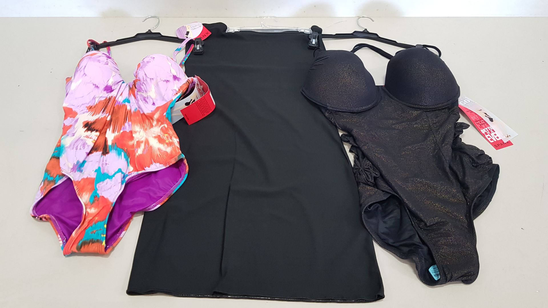 7 PIECE MIXED SPANX LOT CONTAINING 3 X SPANX BLACK & GOLD ONE PIECE SWIMSUITS AND 4 X SPANX AQUA