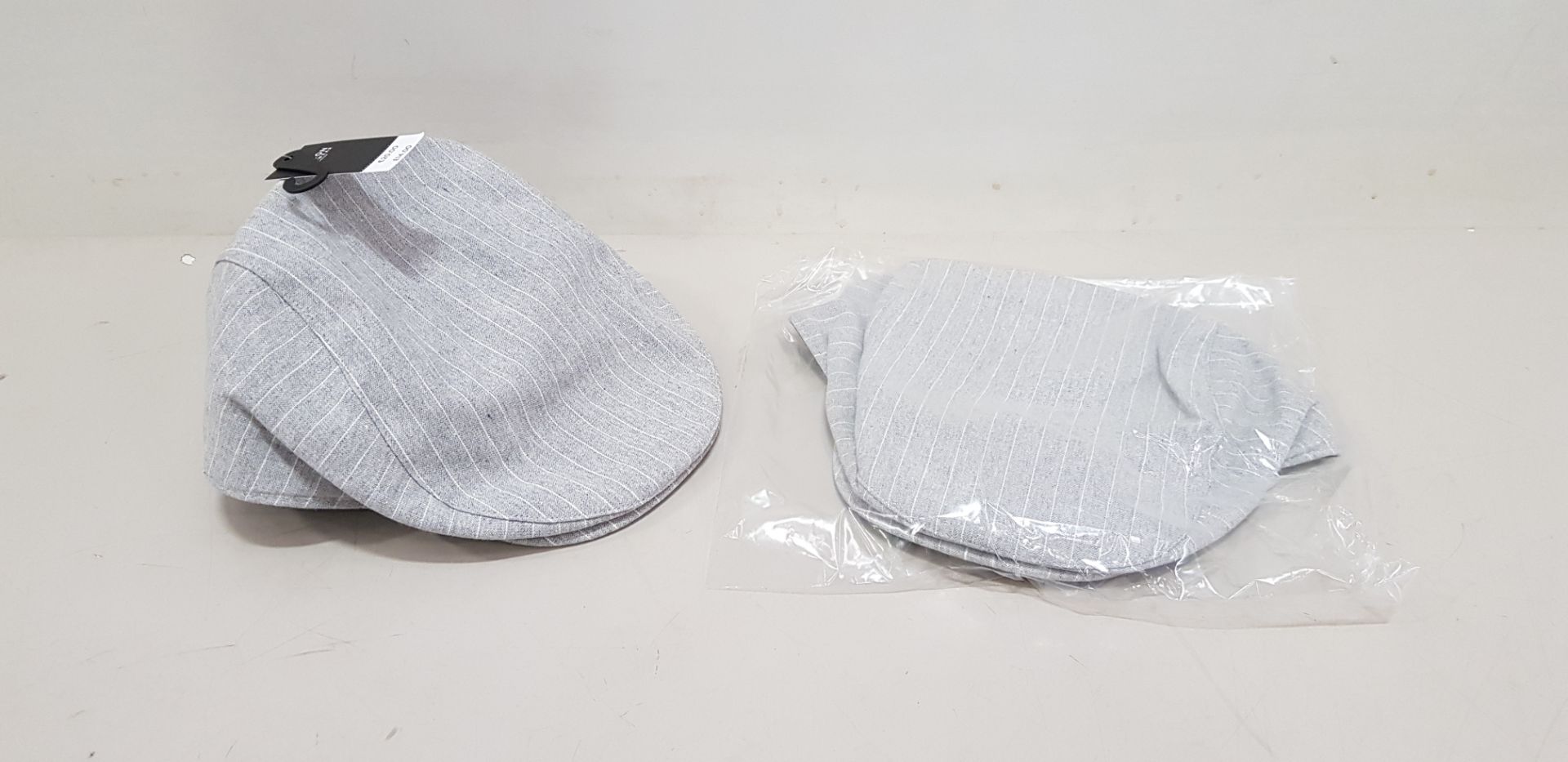 44 X BRAND NEW BURTON MENSWEAR FLAT CAPS IN GREY SIZE M/L