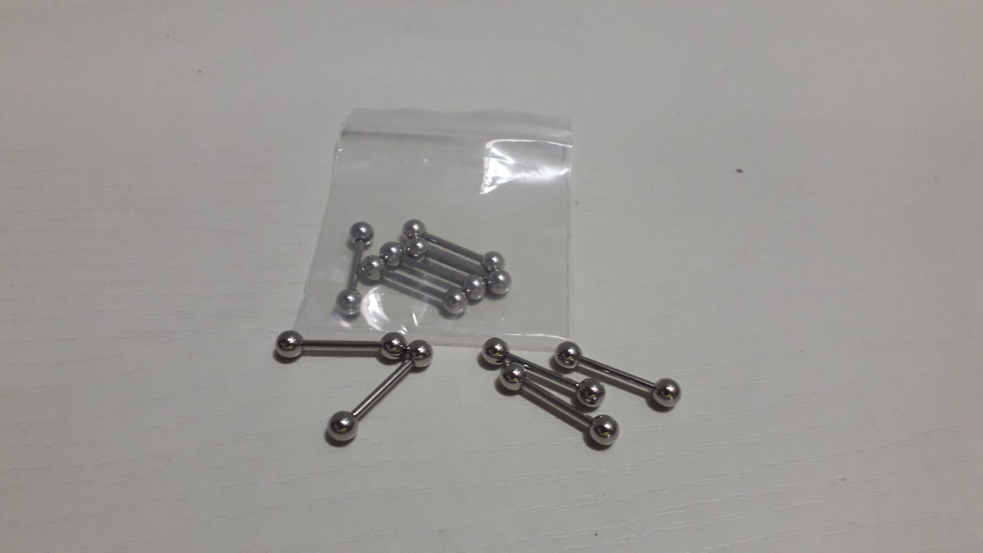 APPROX 1500 X BRAND NEW SILVER COLOURED BARRELL BELLY BARS IN 1 BAG