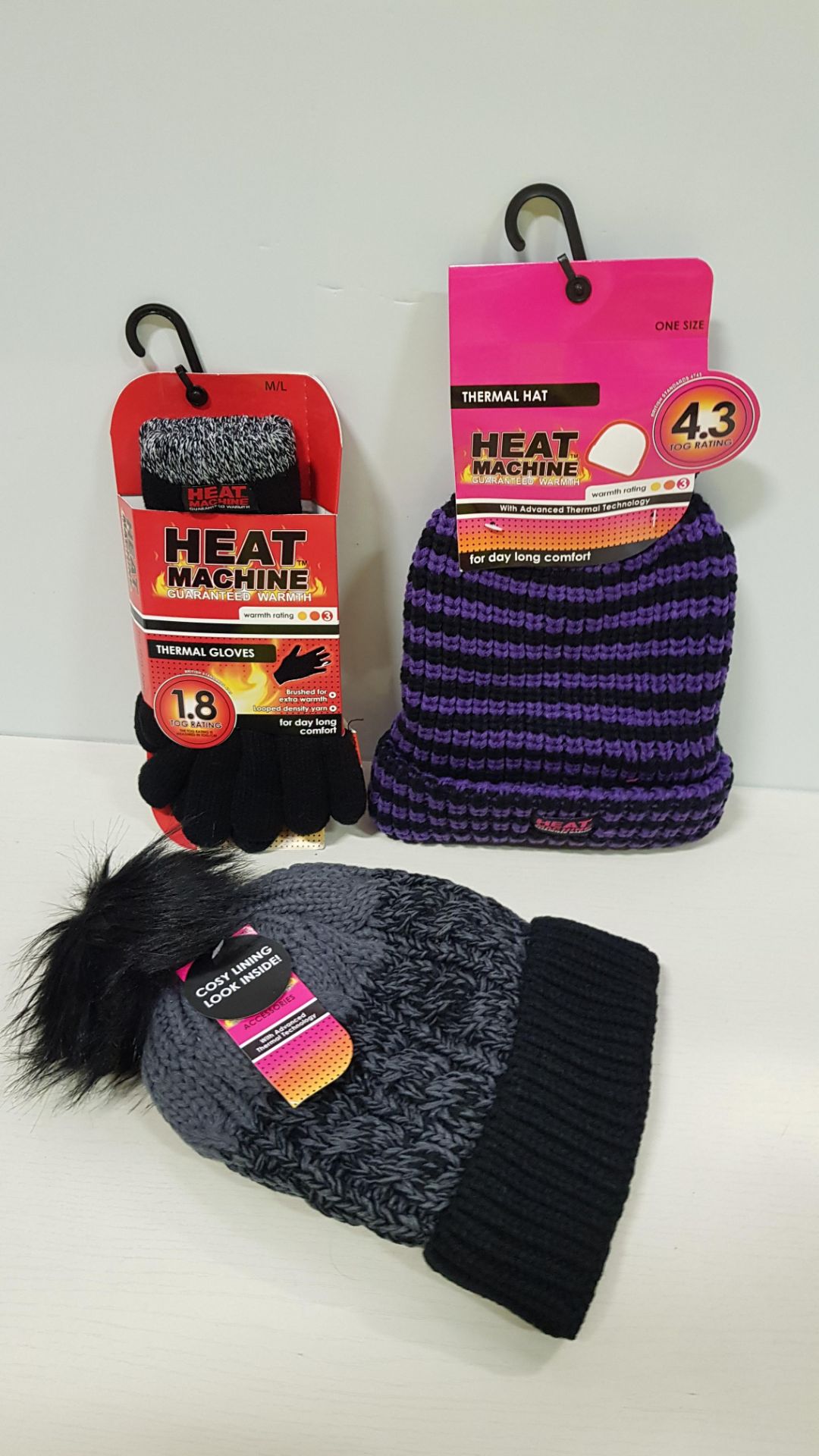 66 PIECE MIXED CLOTHING LOT CONTAINING THE HEAT MACHINE THERMAL HATS IN VARIOUS STYLES AND THERMAL