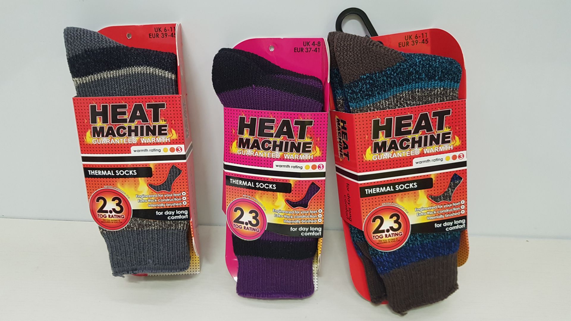 30 PIECE MIXED CLOTHNG LOT CONTAINING HEAT MACHINE THERMAL SOCKS IN VARIOUS COLOURS AND SIZES