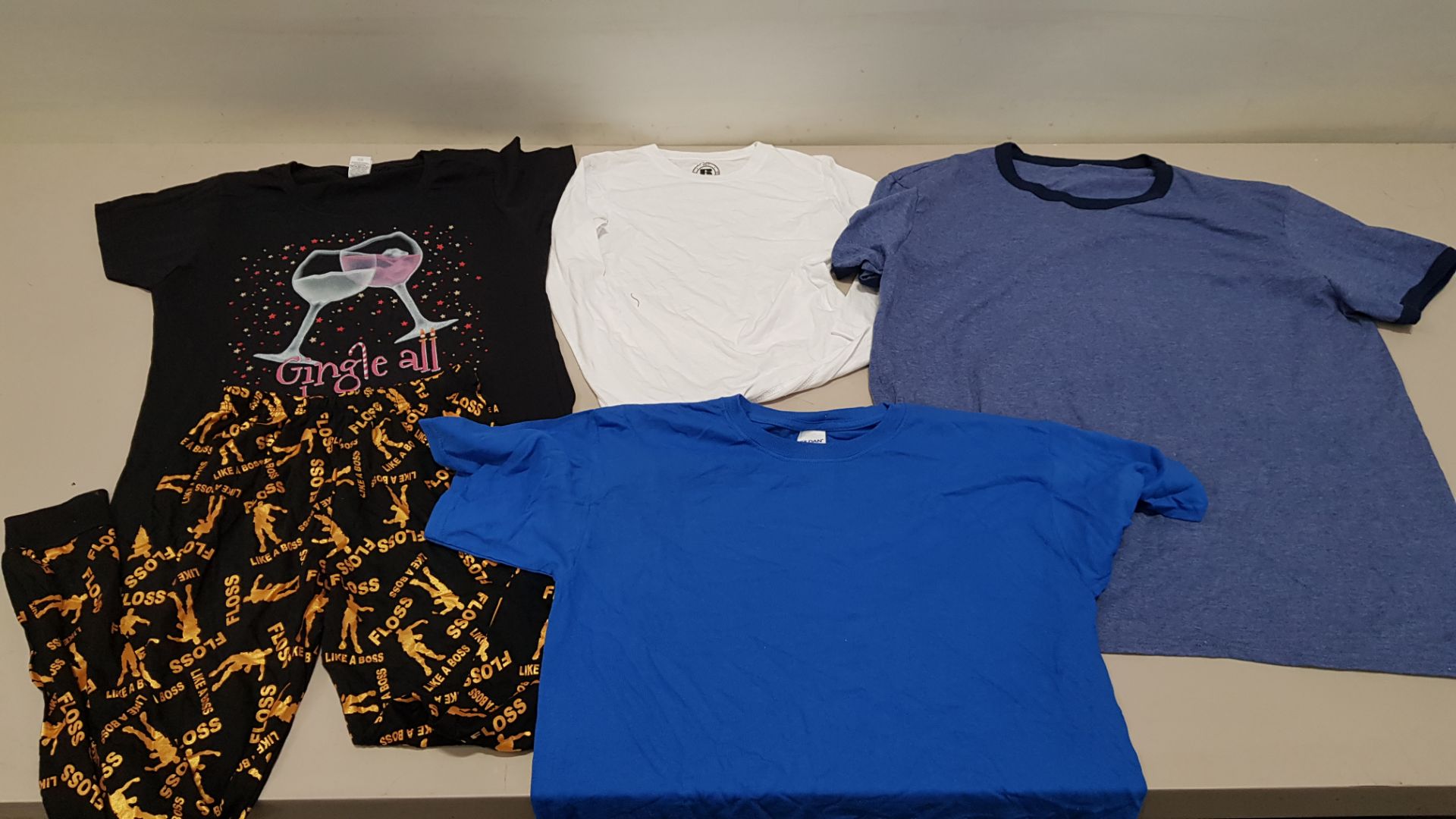 50 PIECE MIXED CLOTHING LOT CONTAINING FORTNITE T SHIRTS, KIDS SHORTS, FOOTBALL T SHIRTS AND VARIOUS