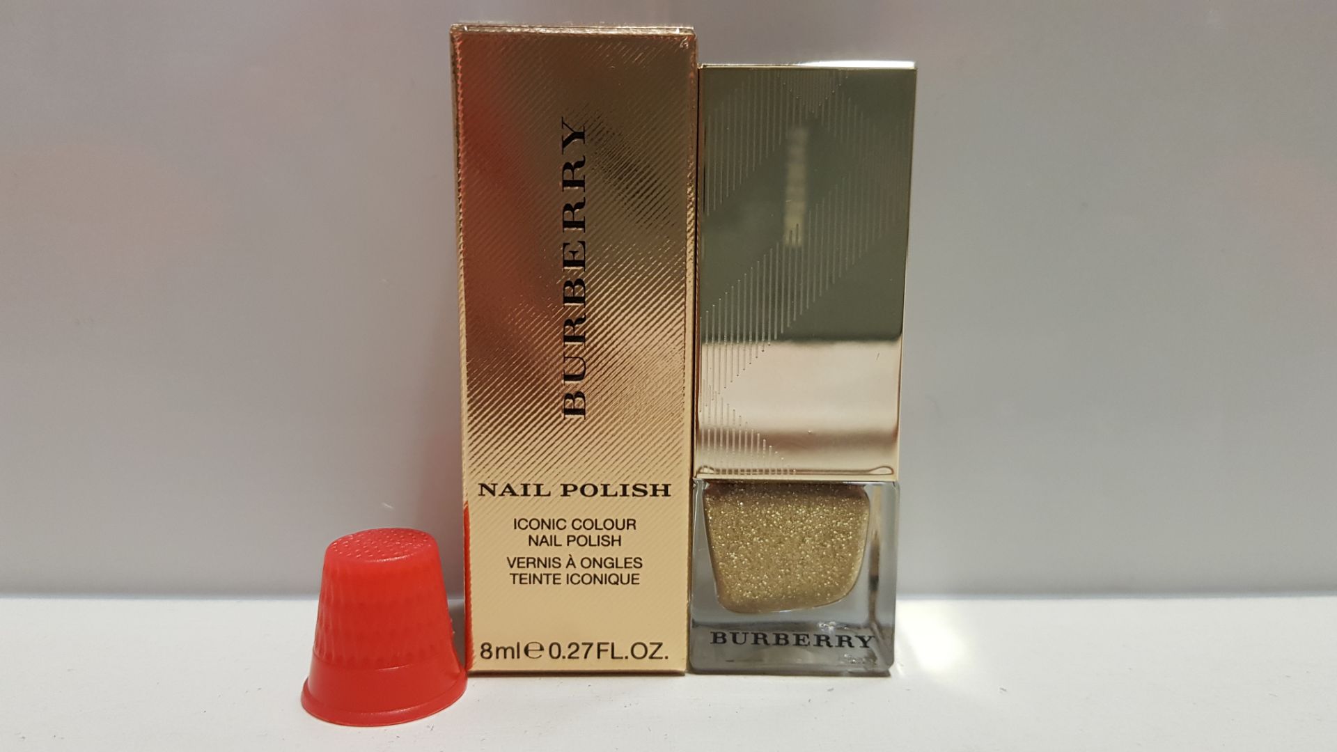 24 X BRAND NEW BURBERRY GOLD SHIMMER ICONIC NAIL POLISH - 8ml (NOTE: BOXES SLIGHTLY DAMAGED)