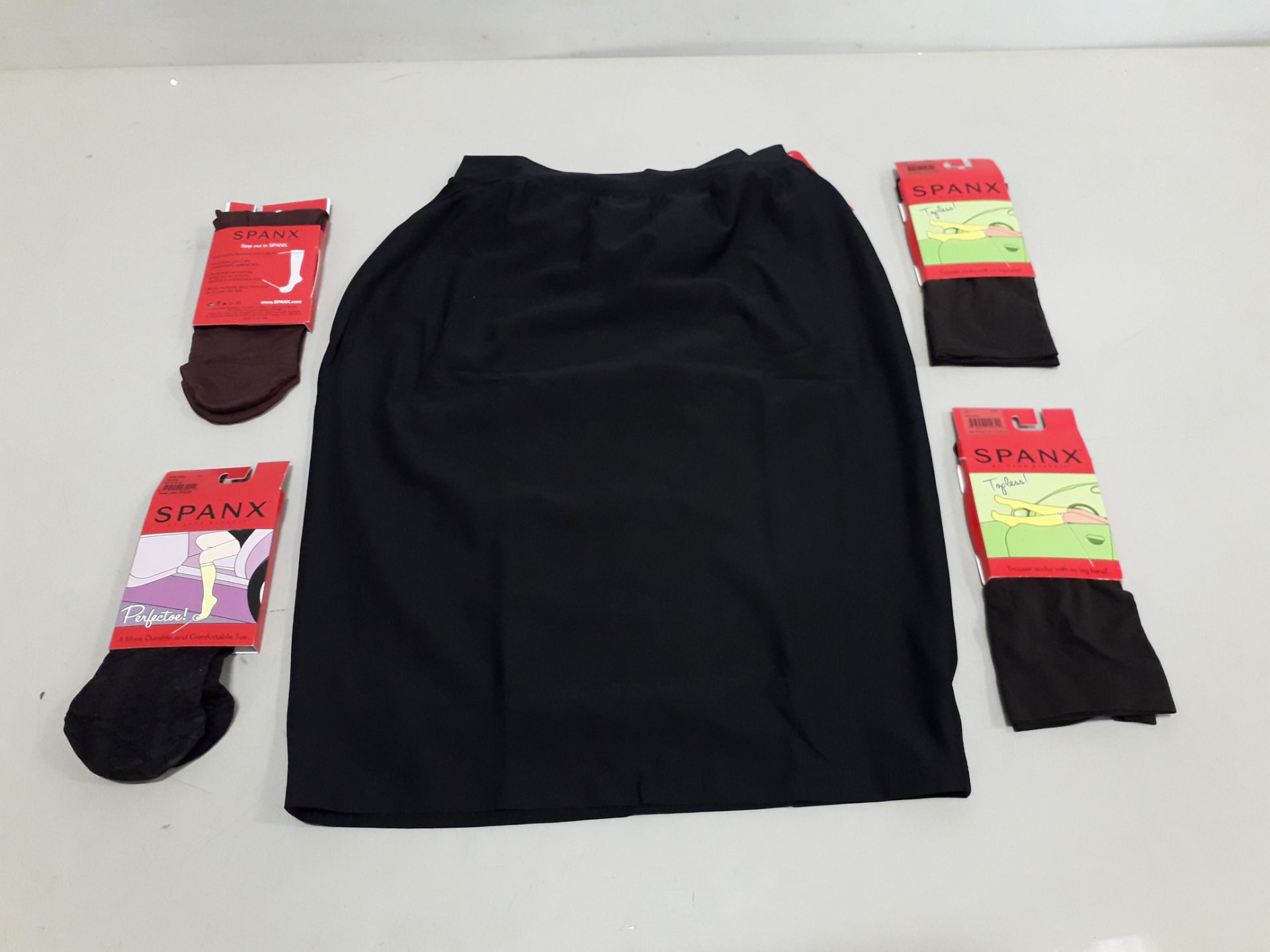 50 X MIXED SPANX LOT CONTAINING LARGE SHAPING SKIRT , BITTERSWEET TROUSER SOCKS , TOPLESS TROUSERS