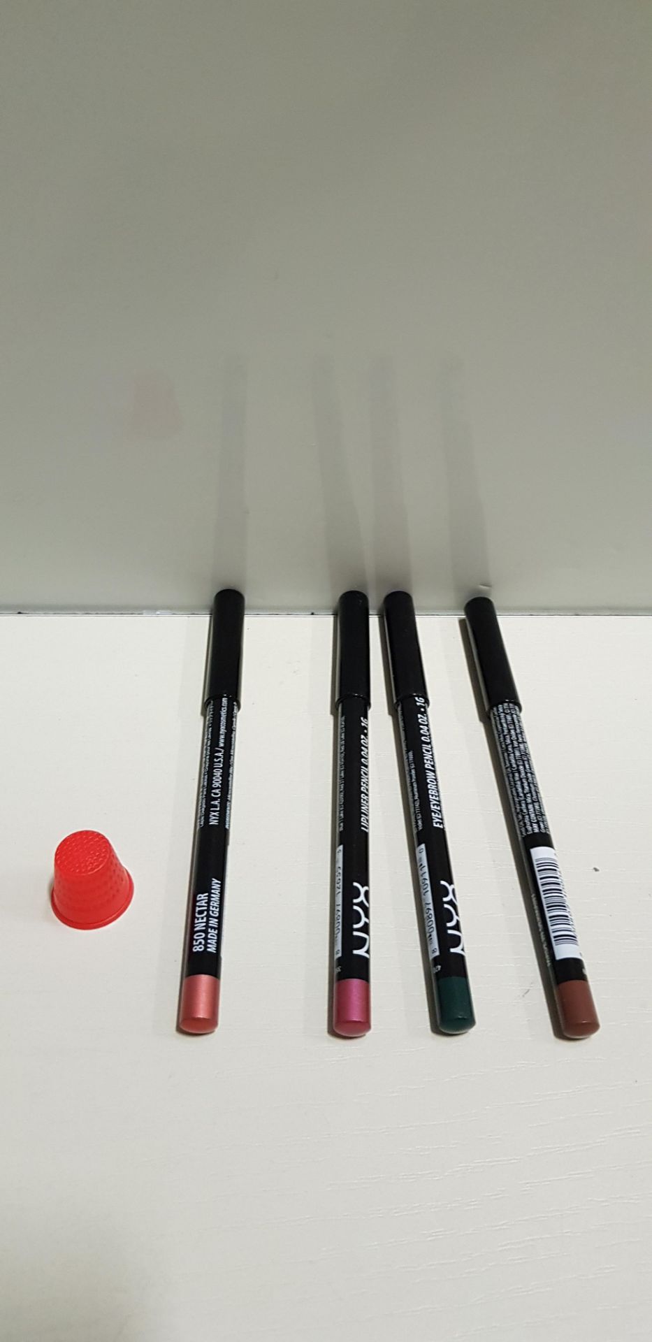 100 PIECE MIXED NYX LIP PENCIL AND EYEBROW PENCIL LOT CONTAINING NECTAR LIP PENCIL, CITRINE LIP