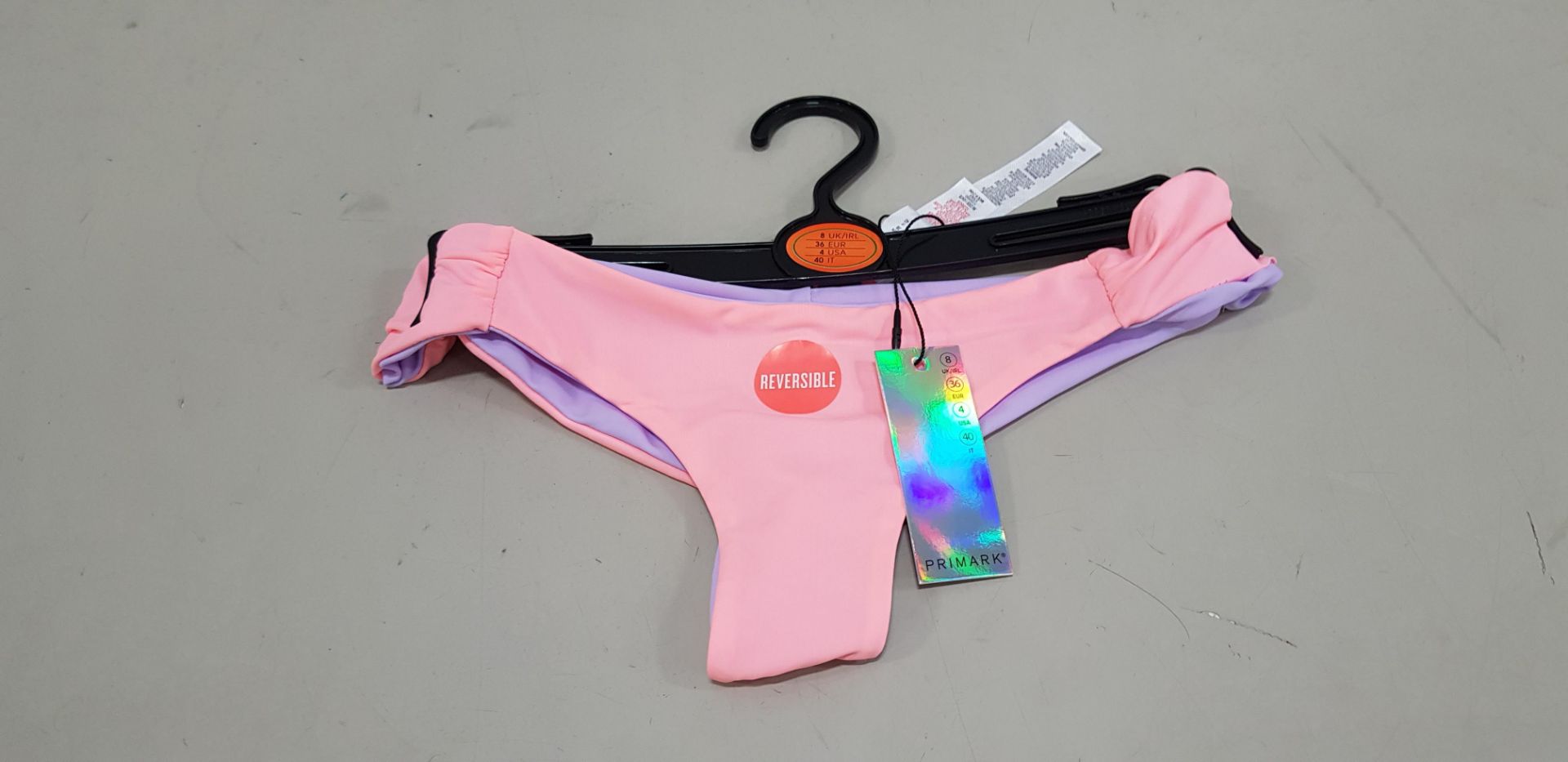 120 X BRAND NEW PRIMARK REVERSIBLE CORAL AND LILAC BIKINI BOTTOMS IN ALL RATIO SIZES 6-18 RRP €5.