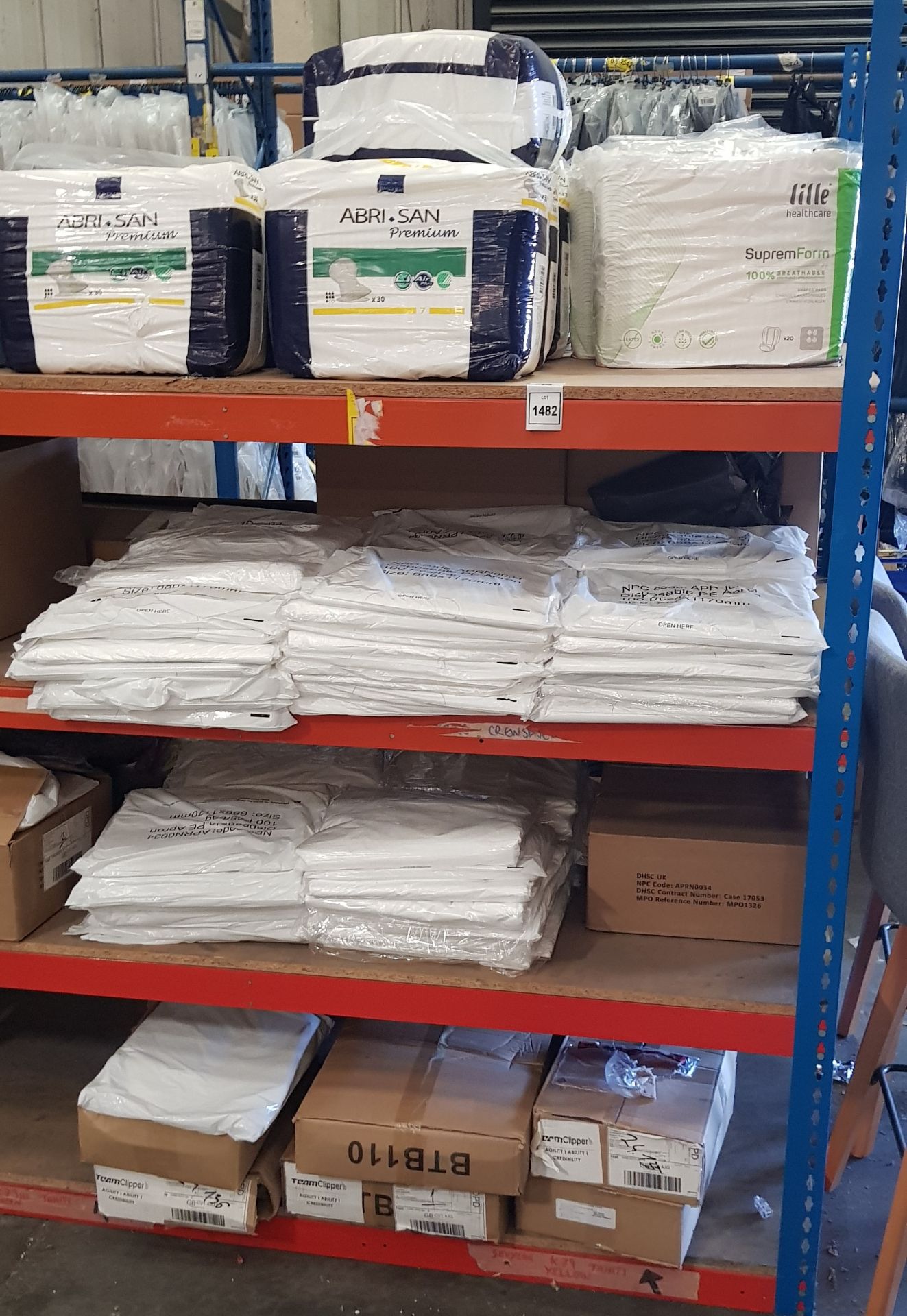 4 SHELVES OF PPE EQUIPMENT IE. ESTD 10,000+ PE APRONS, 240 X INCONTINENCE NAPPIES, FACE MASKS &