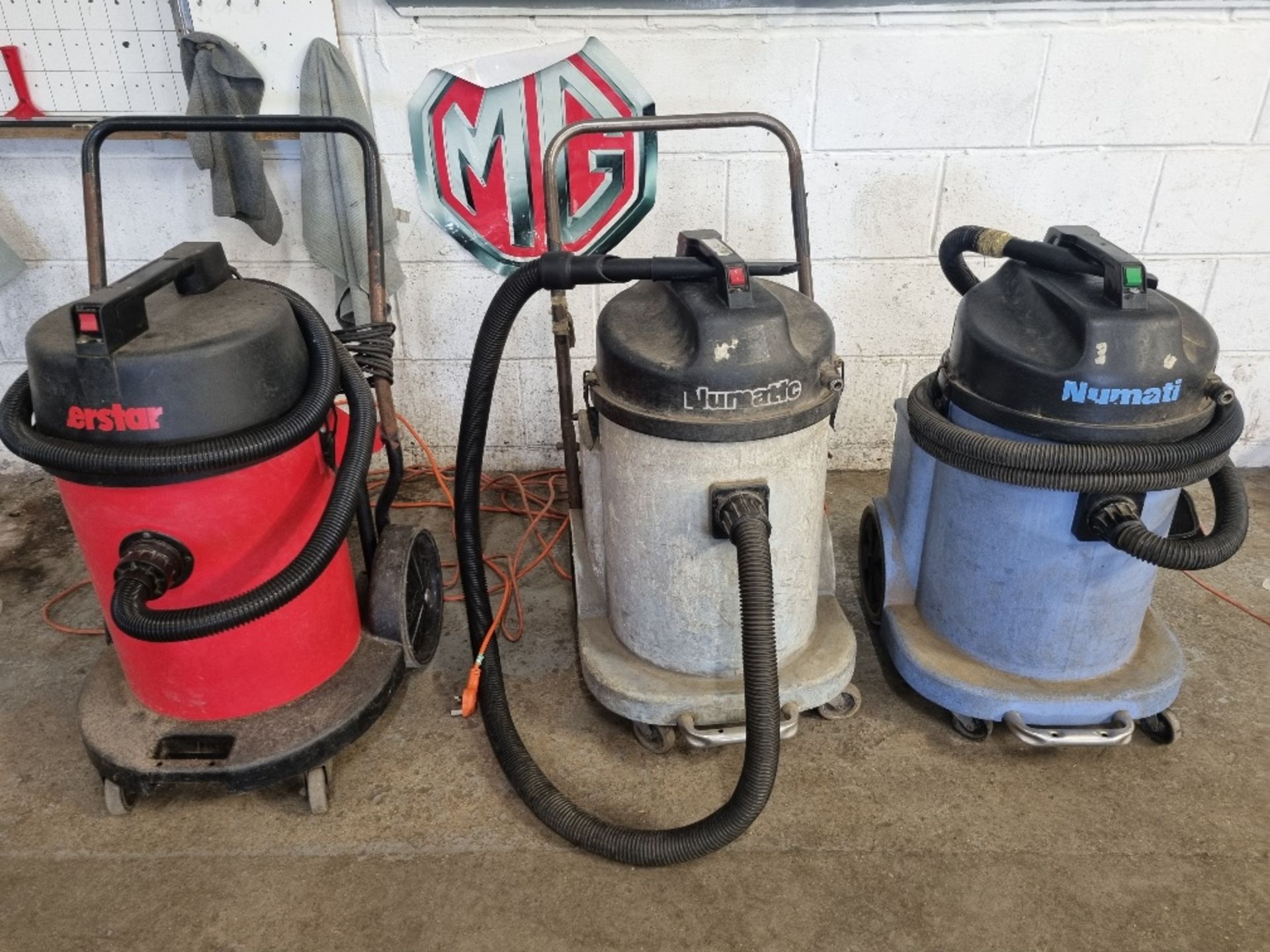 THREE COMMERCIAL VACUUM CLEANERS