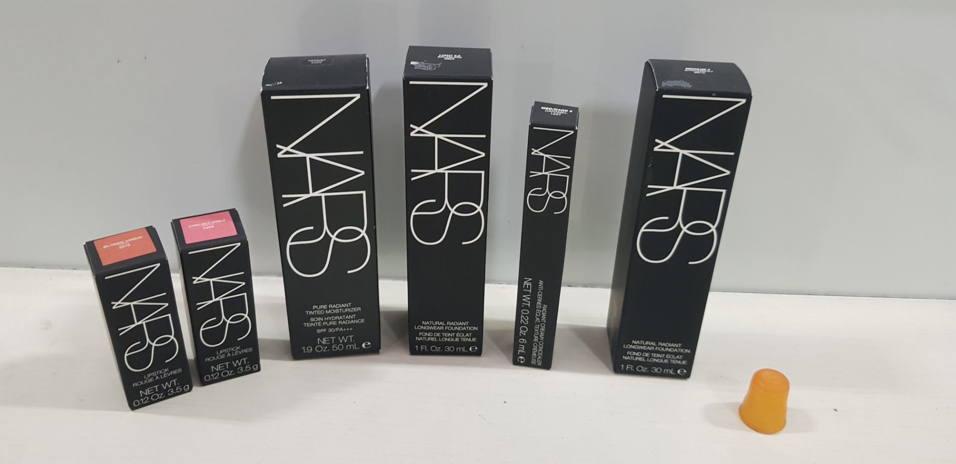 25+ PIECE MIXED NARS COSMETIC LOT TO INCLUDE, RADIANT CREAMY CONCEALER, PURE RADIANT TINTED