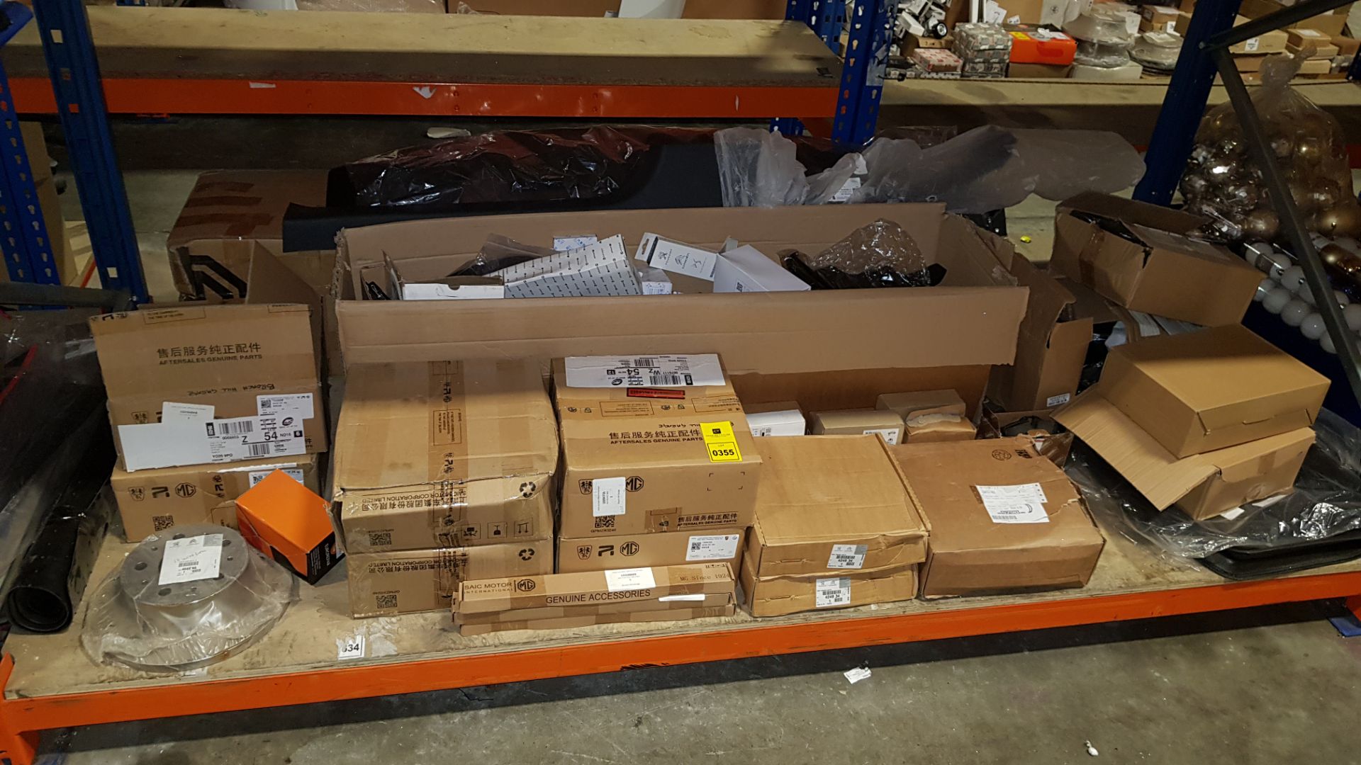 APPROX 50+ BRAND NEW PIECE MIXED AUTOMOTIVE LOT CONTAINING REAR DIFFUSOR BUMPER, BREAK PADS, FUEL