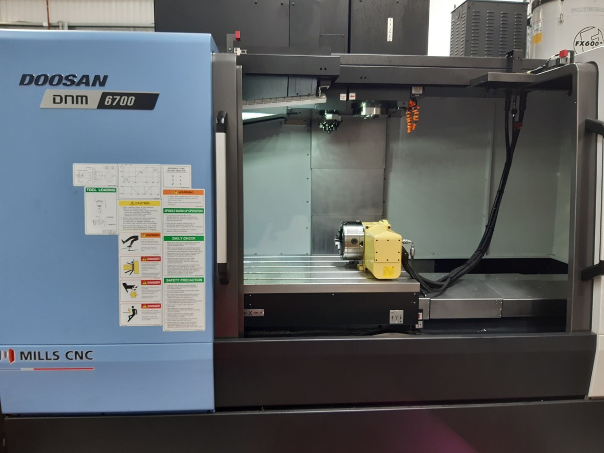 2021 Doosan DNM 6700 vertical machining centre 59.”" x 26.”" table