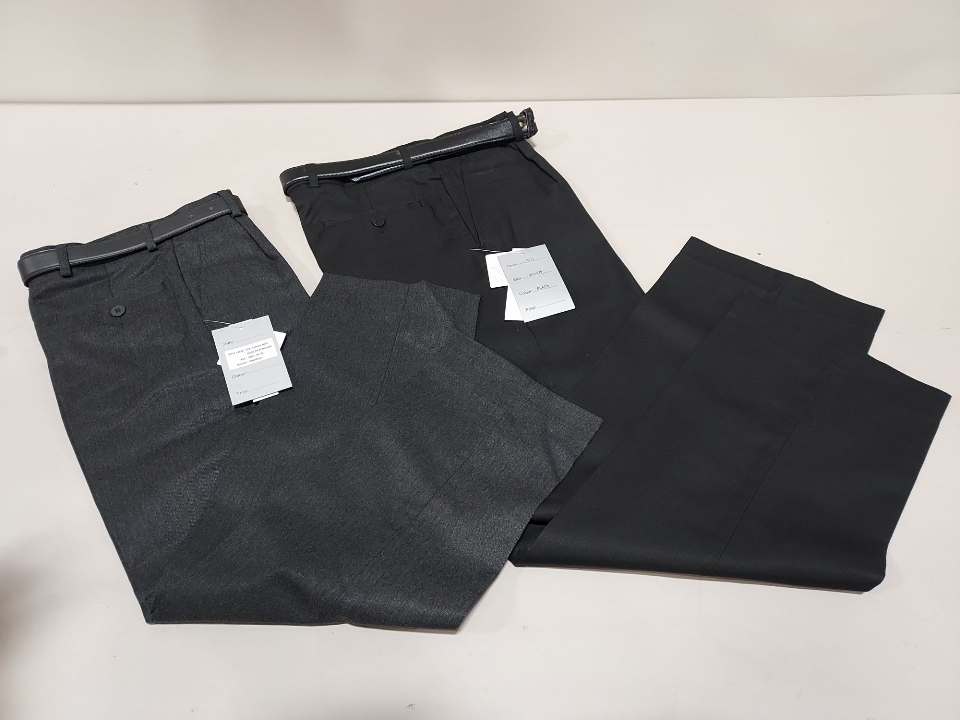 100 + PIECE MIXED WINTERBOTTOMS TROUSERS LOT IN VARIOUS COLOURS AND SIZES IE. CHARCOAL AND BLACK