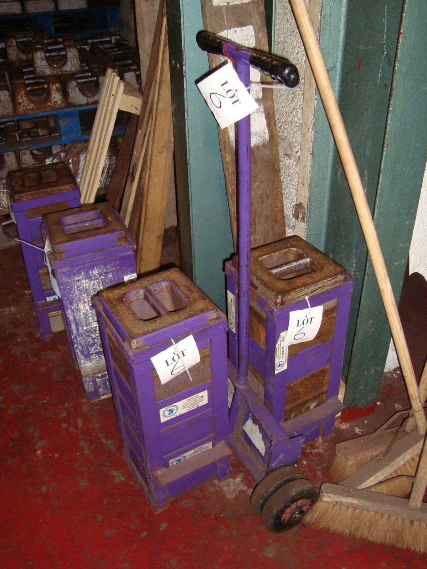 A quantity of 20kg test weights with four stillages and trolley