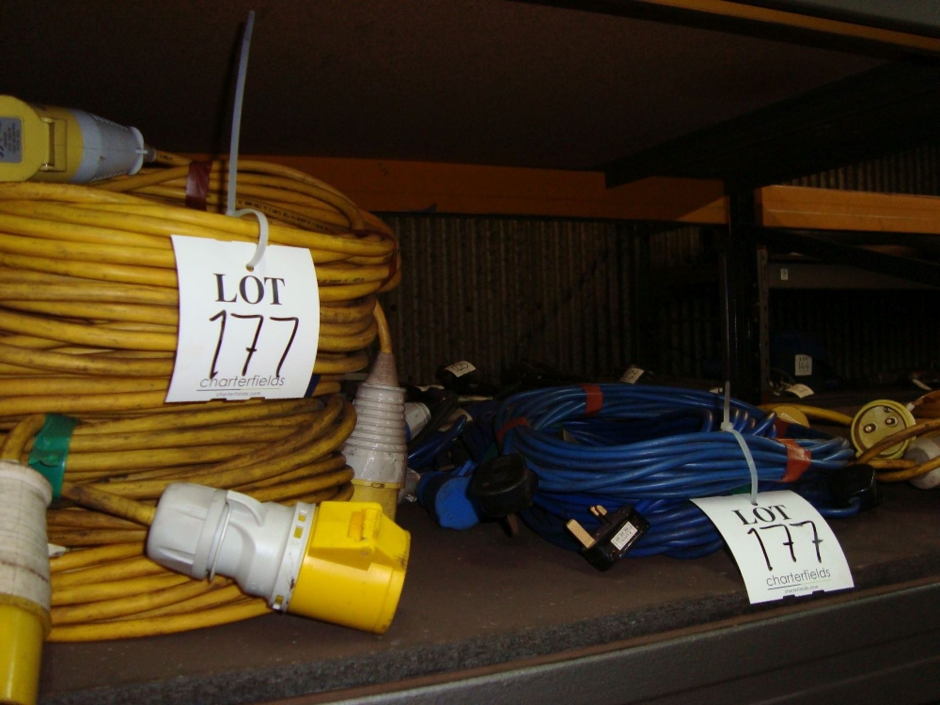 A quantity of various 110V leads, splitter boxes and site lamps, as lotted