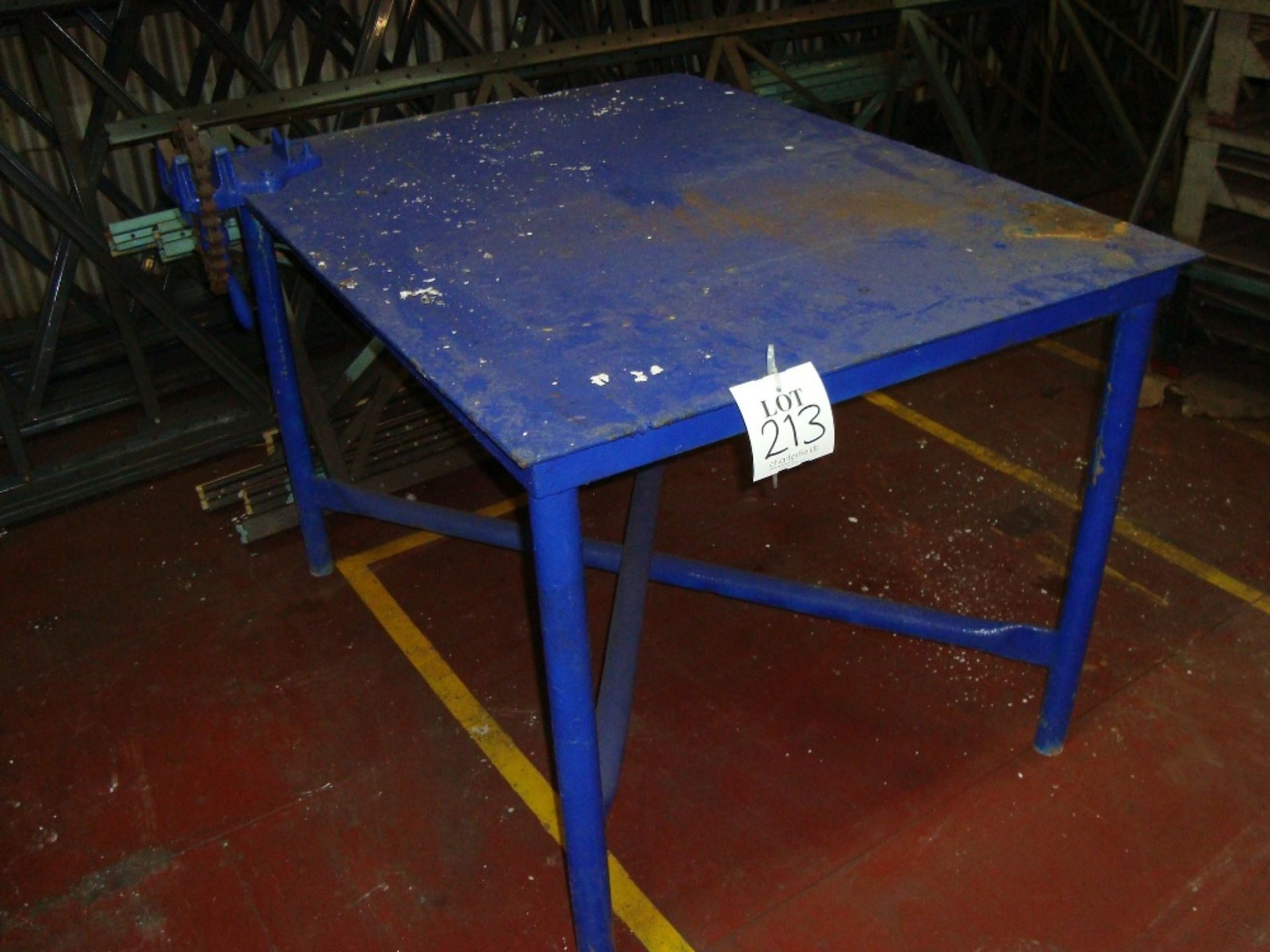 A metal workbench complete with chain vice