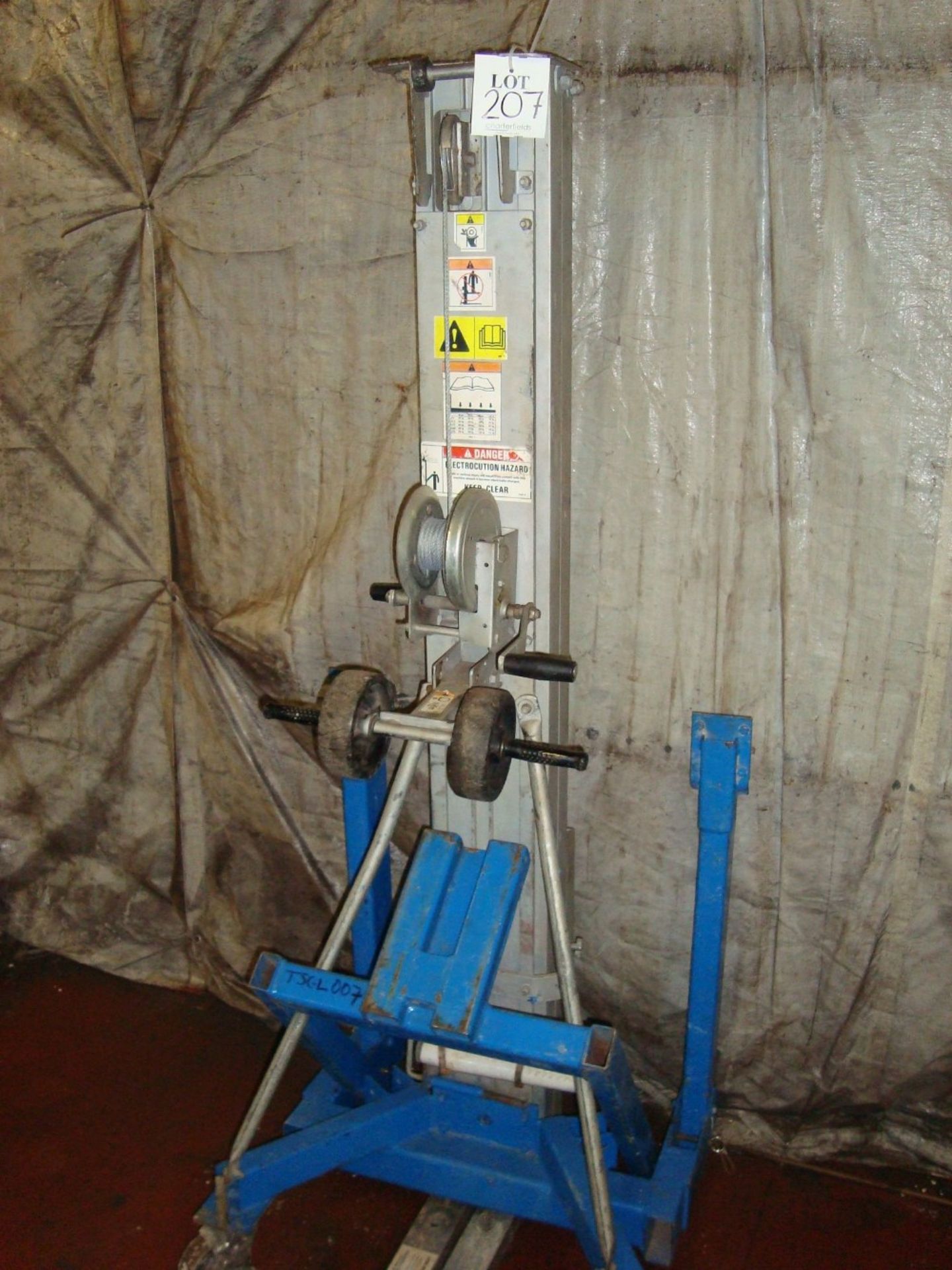 A Genie SLA10 lift, SWL 454kg with extension forks